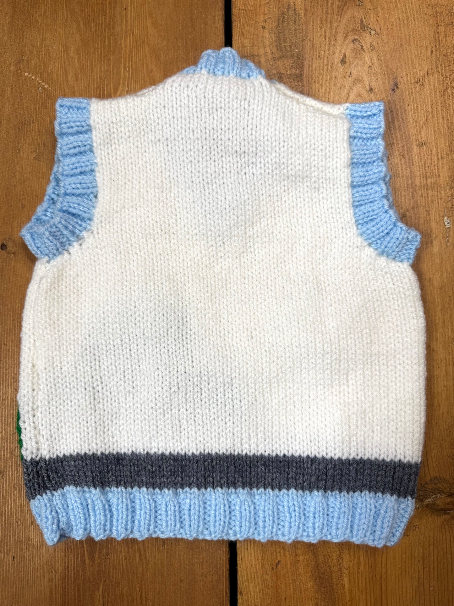 Handknitted vintage style kids sweater vest with car detail. Handpicked for Bee Tiny.