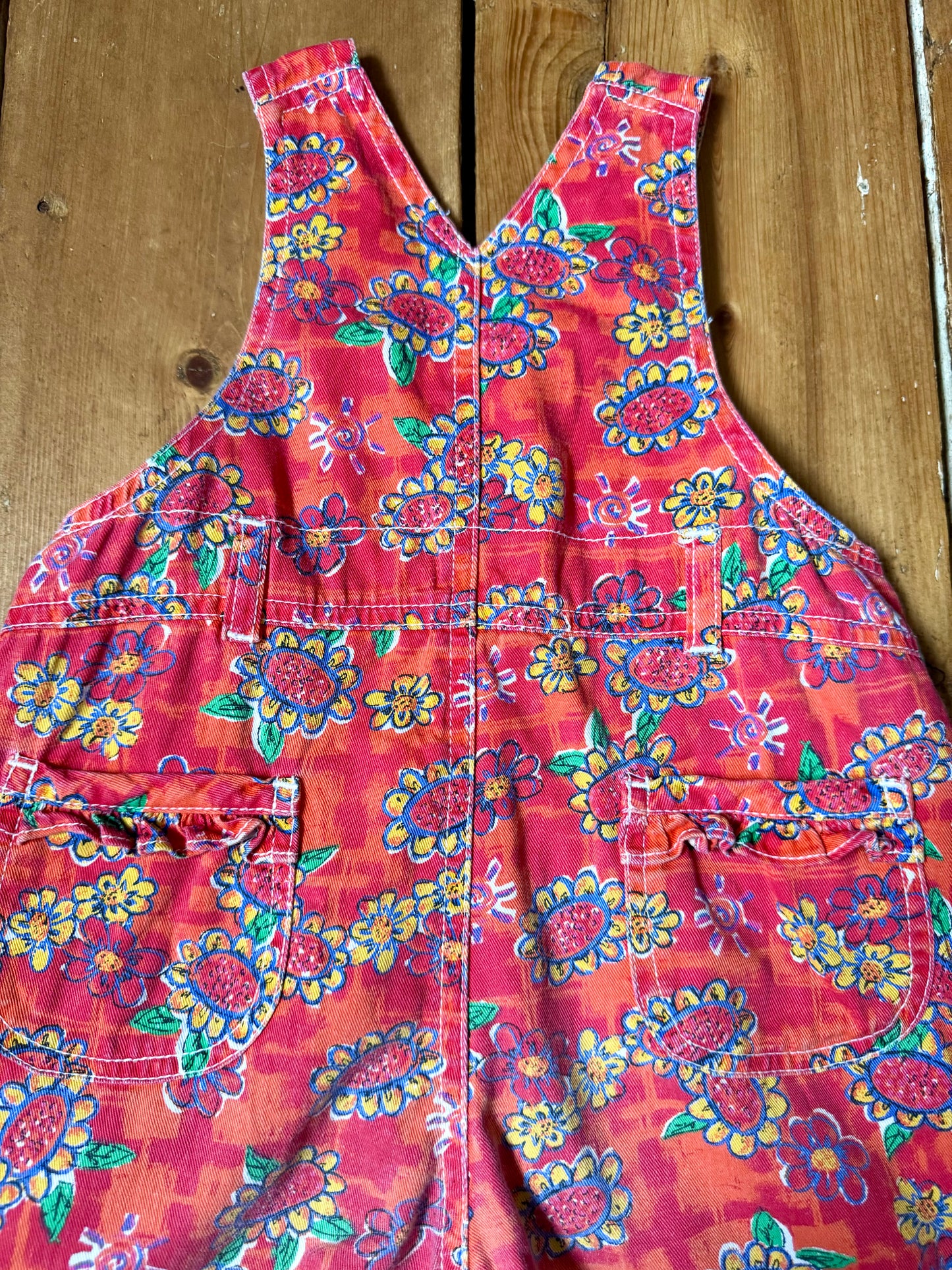 Vintage 90s Ladybird kids dungaree shorts. 90s floral print dungaree shorts. Age 1-2 years. Handpicked for Bee Tiny kids vintage.