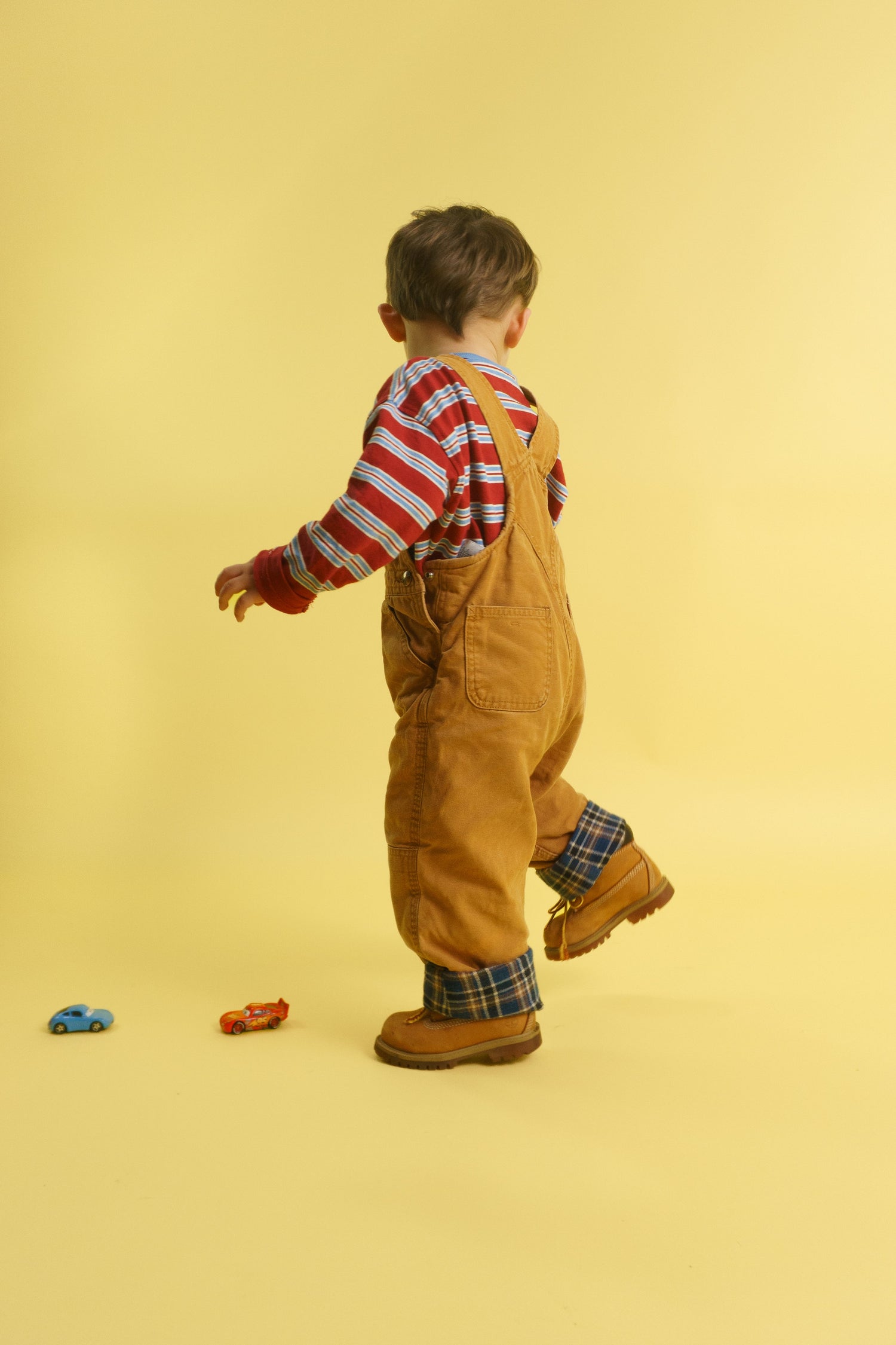 Toddler playing with their brother