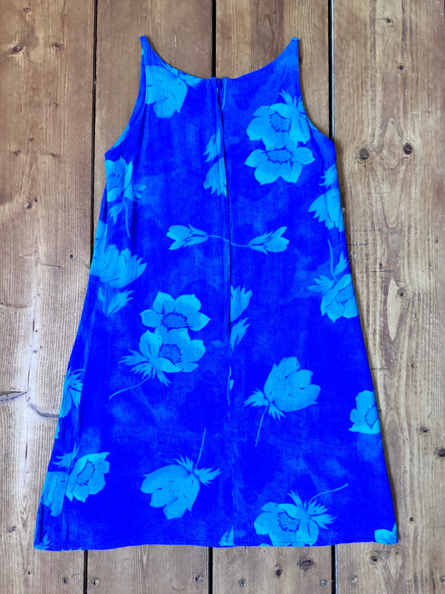 Vintage 90s Debenhams blue floral shift dress for kids. Made in the U.K. from 100% viscose with a timeless A-line silhouette. Handpicked for Bee Tiny kids vintage.