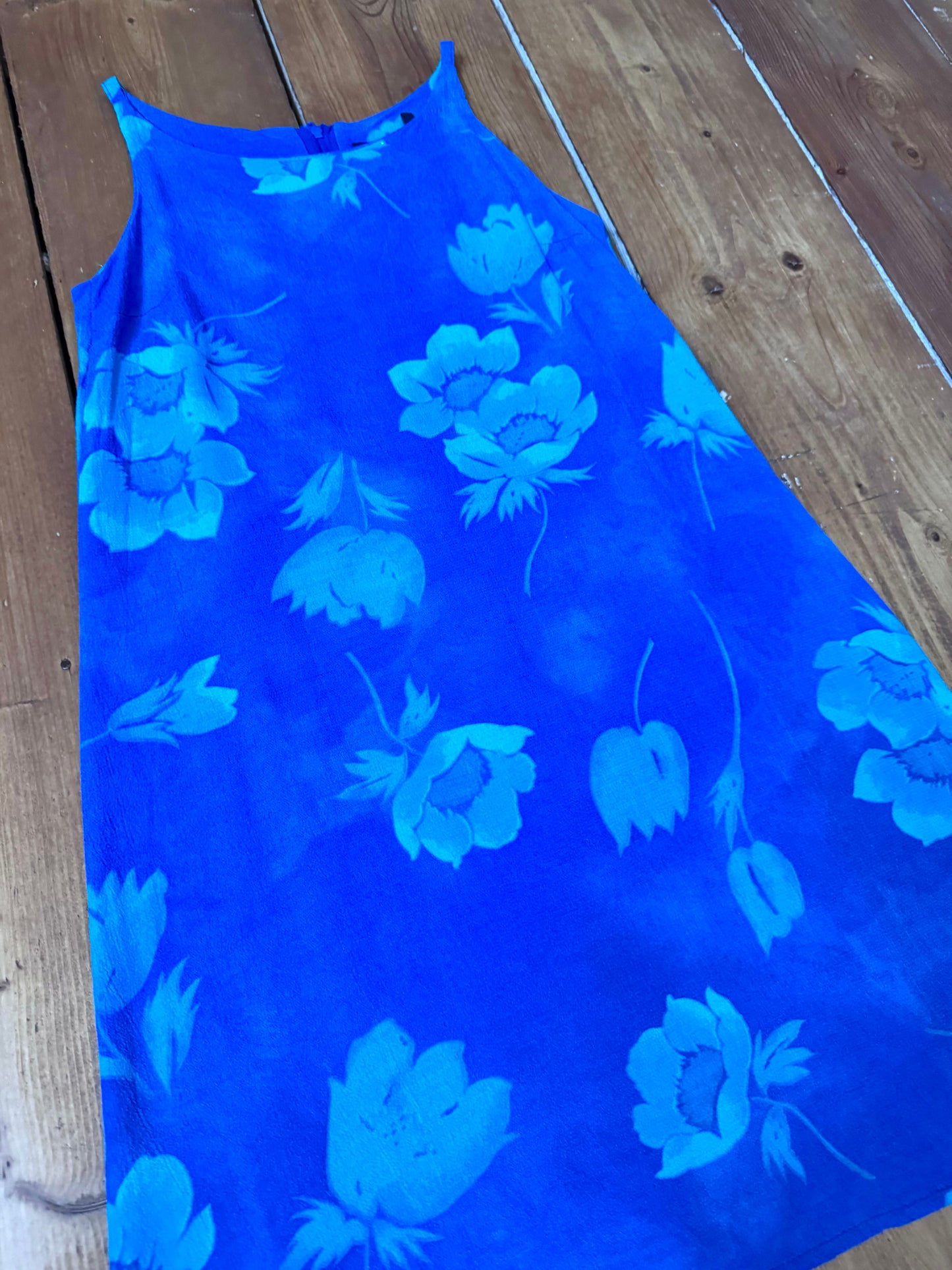 Vintage 90s Debenhams blue floral shift dress for kids. Made in the U.K. from 100% viscose with a timeless A-line silhouette. Handpicked for Bee Tiny kids vintage.