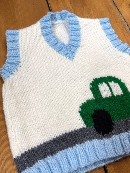 Handknitted vintage style kids sweater vest with car detail. Handpicked for Bee Tiny.