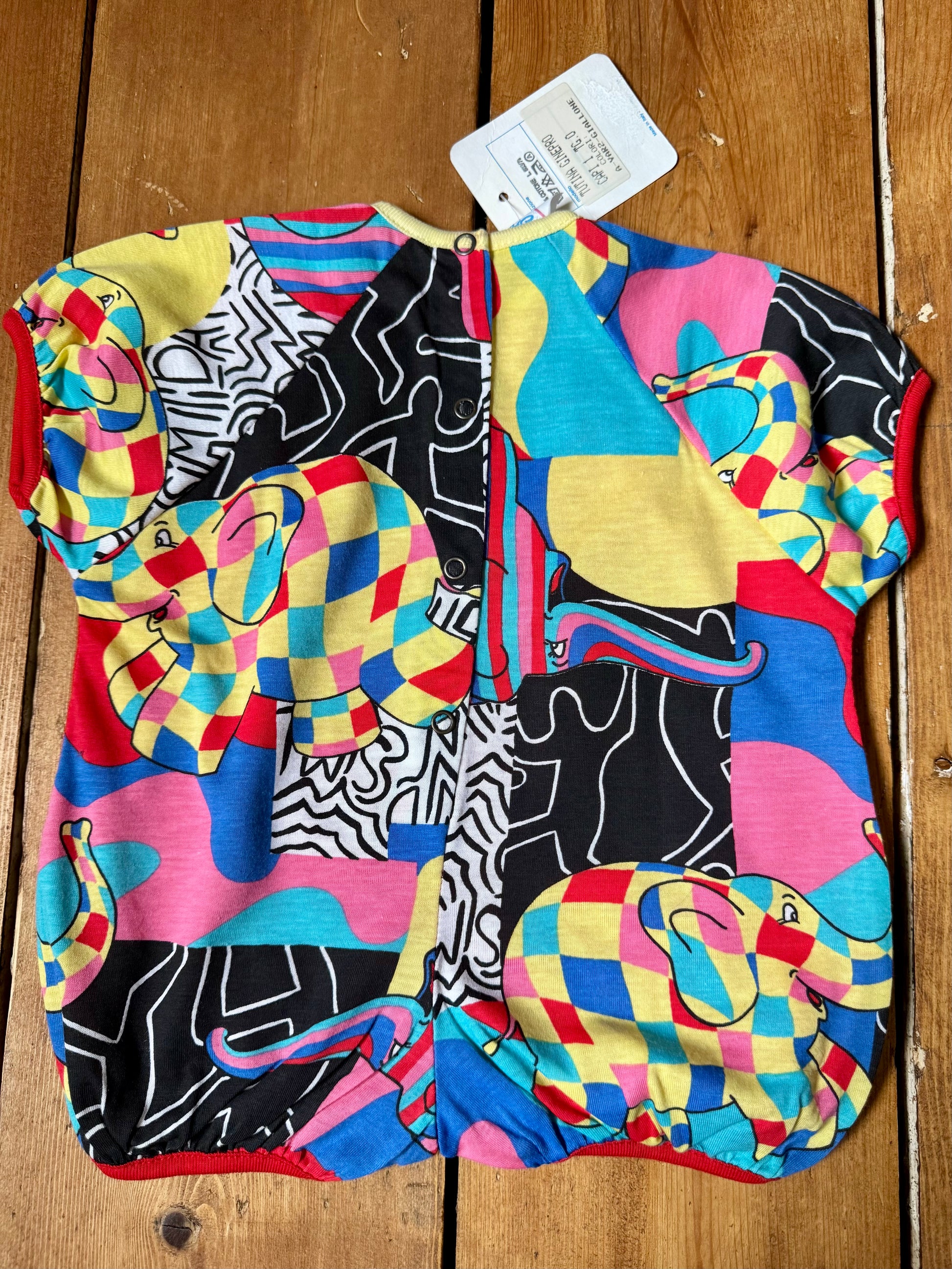 Vintage 90s colourful elephant baby romper with bold prints. Handpicked for Bee Tiny kids vintage.