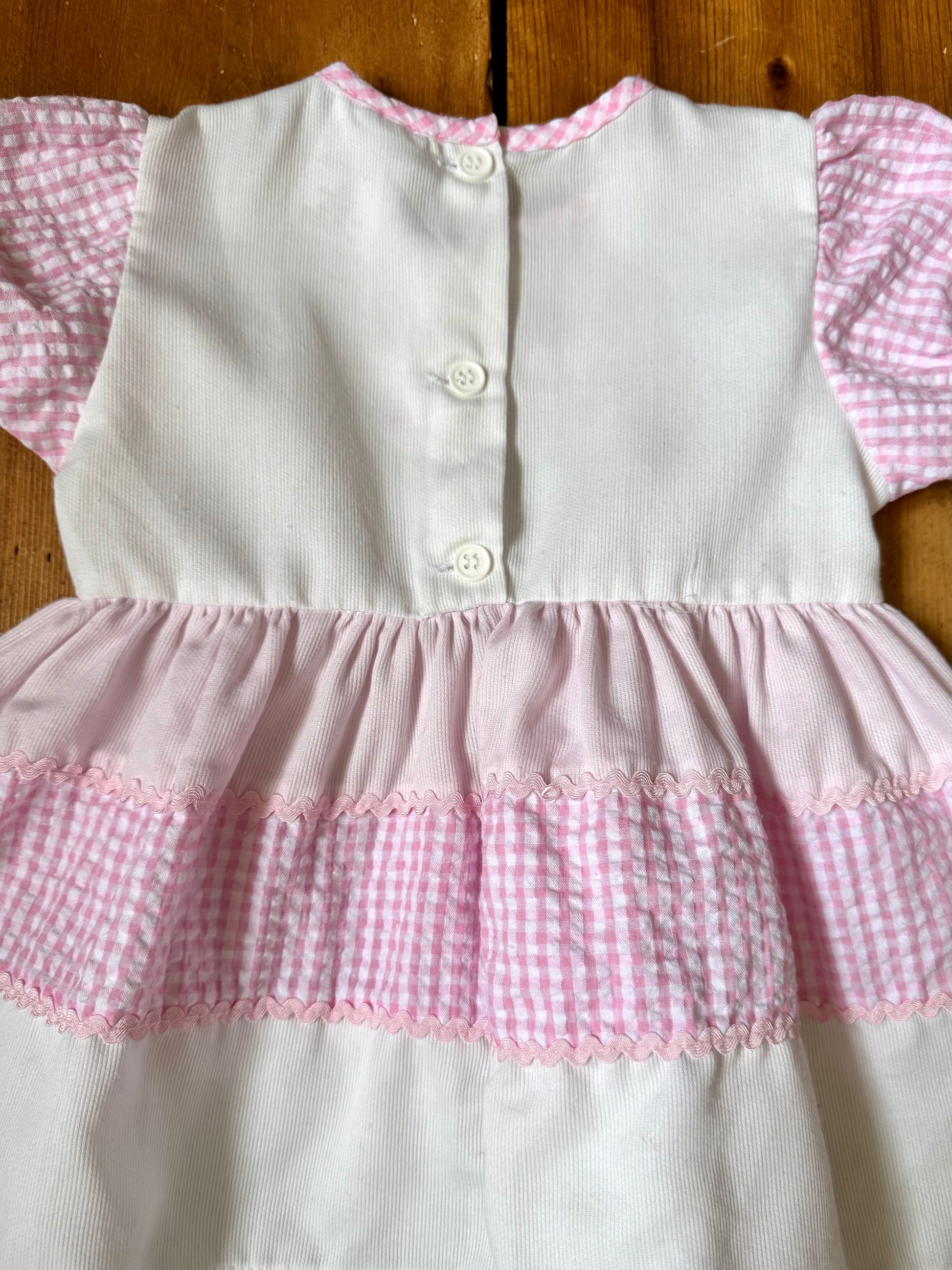 Vintage pink gingham toddler dress with embroidered tulips and puff sleeves. Authentic late 80s/early 90s children's dress. Handpicked for Bee Tiny.