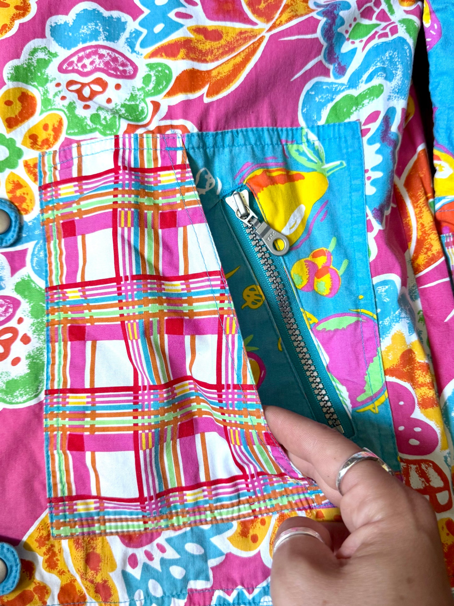 Vintage 90s reversible kids hooded jacket featuring colourful tropical floral prints and a turquoise reverse. Kids vintage lightweight summer coat. Handpicked for Bee Tiny kids vintage.