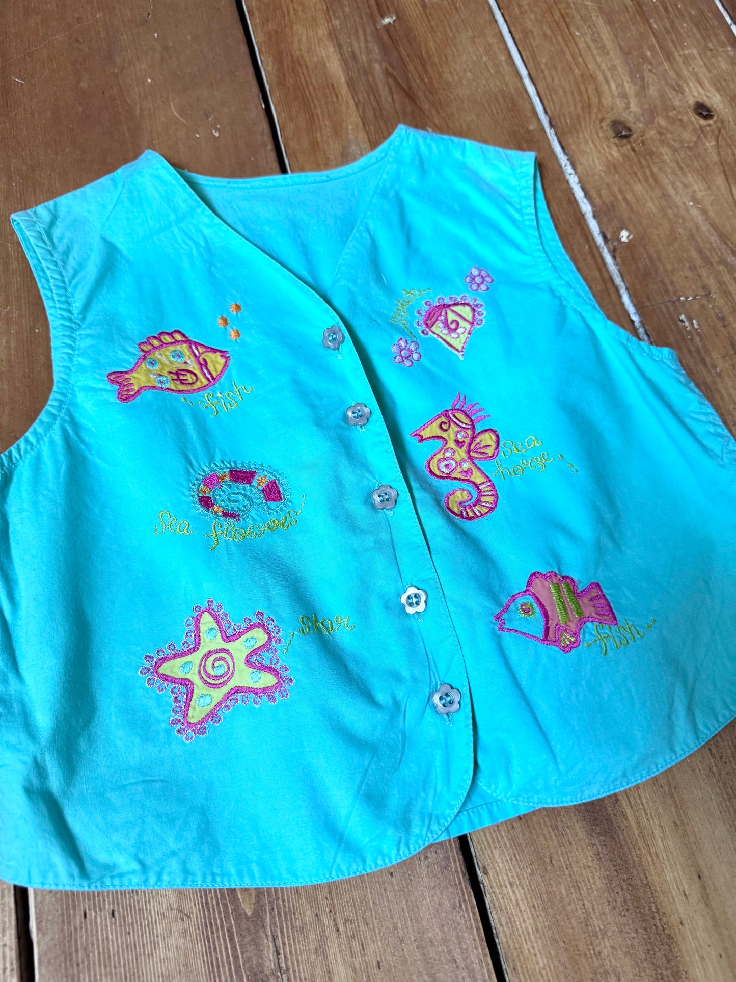 Vintage Y2K embroidered sea life waistcoat for kids with colourful fish details. Perfect for summer adventures. Handpicked for Bee Tiny kids vintage.