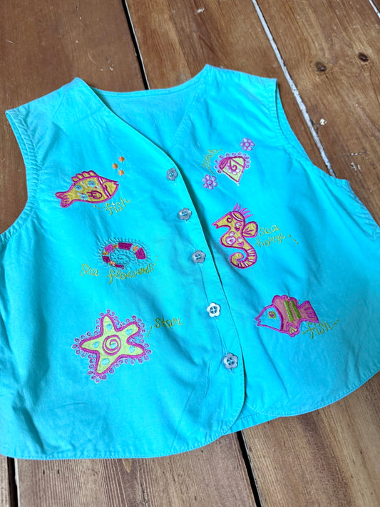 Vintage Y2K embroidered sea life waistcoat for kids with colourful fish details. Perfect for summer adventures. Handpicked for Bee Tiny kids vintage.
