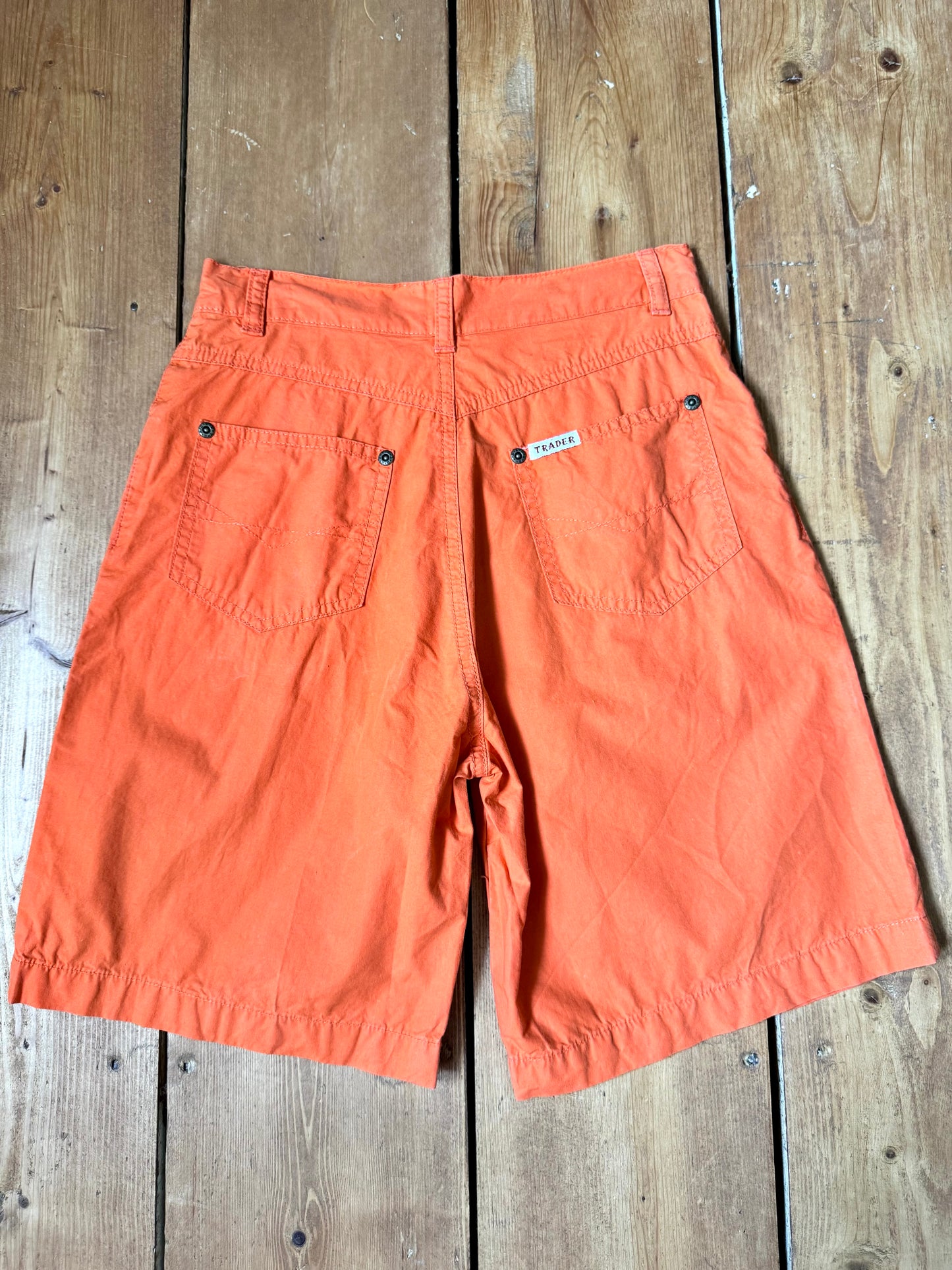 Y2K kids shorts. Vintage orange kids shorts from The Trader Jeans Company. Lightweight Y2K cotton summer shorts in age 10. Handpicked for Bee Tiny kids vintage.