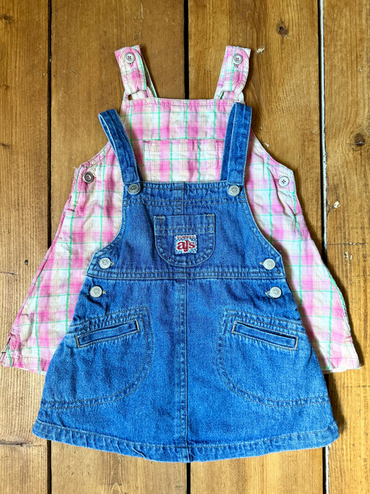 Vintage baby dress bundle featuring an Adams denim pinafore and pink gingham summer dress. Two timeless outfits for babies aged 6–9 months. Handpicked for Bee Tiny kids vintage.