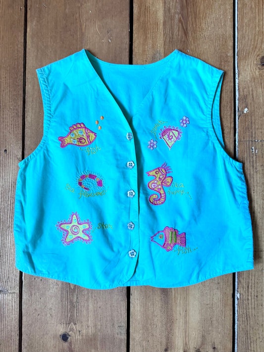Vintage Y2K embroidered sea life waistcoat for kids with colourful fish details. Perfect for summer adventures. Handpicked for Bee Tiny kids vintage.
