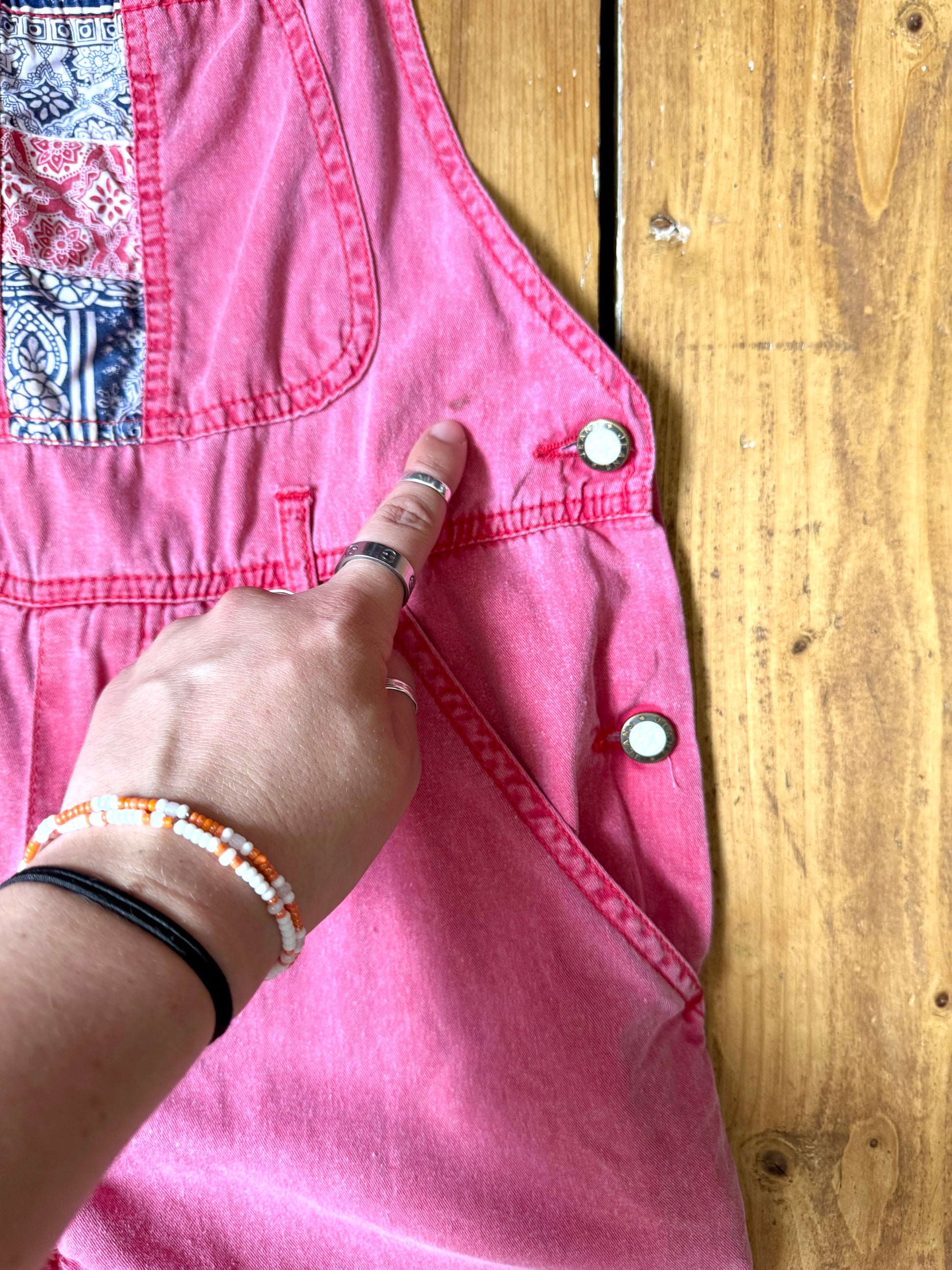 Vintage 90s pink dungaree shorts with paisley patchwork detailing. A colourful summer vintage favourite for kids. Handpicked for Bee Tiny kids vintage. 