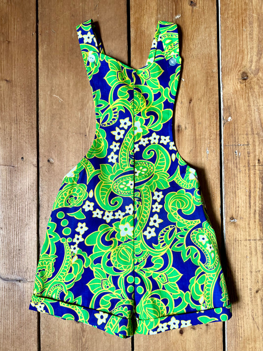 Vintage 70s green romper, dungaree shorts. Psychedelic print dungaree shorts. Handpicked for Bee Tiny kids vintage. 