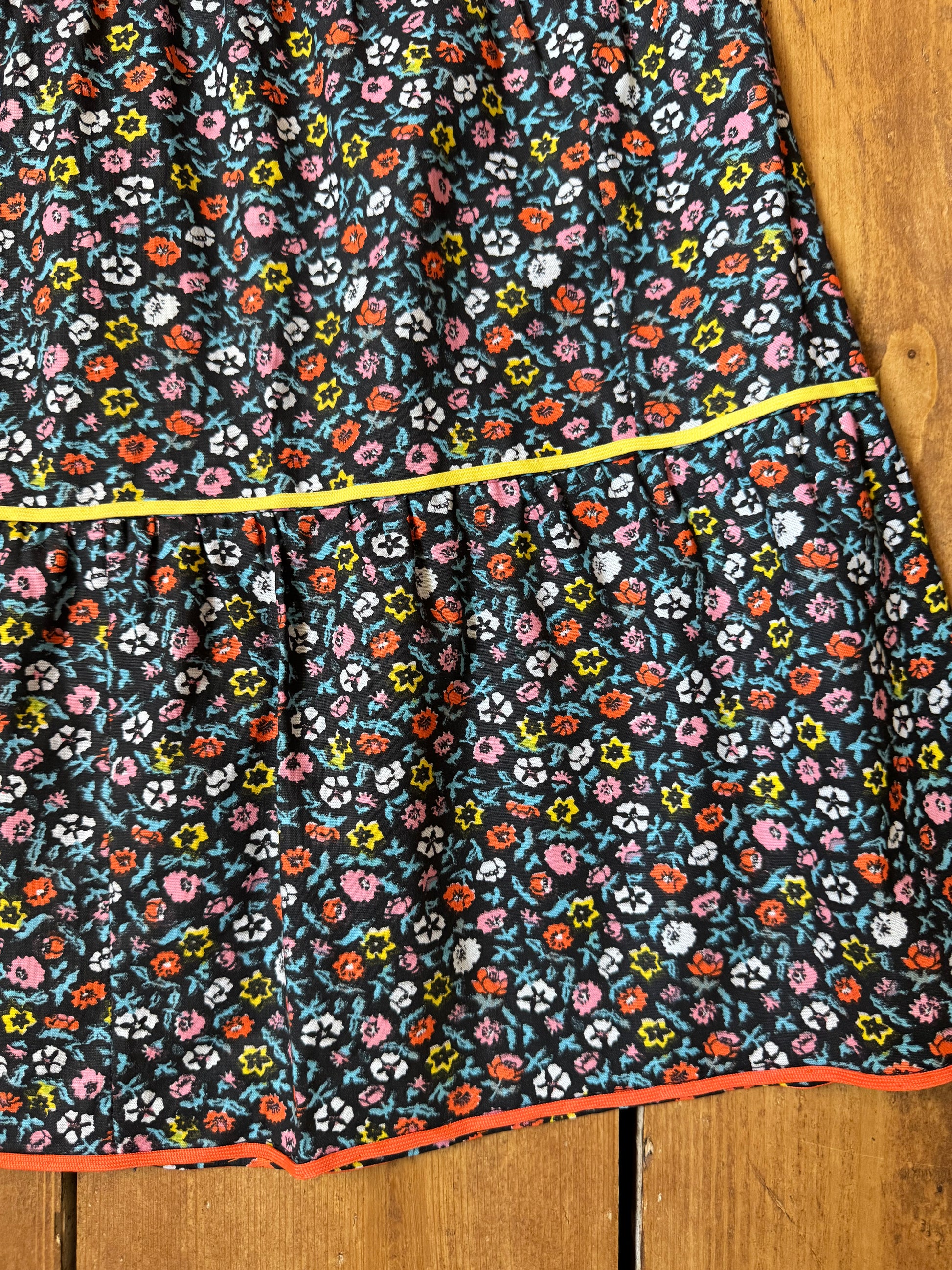 Vintage Italian floral tiered skirt from the late 80s/early 90s with colourful contrast piping and a timeless ditsy print. Handpicked for Bee Tiny kids vintage.