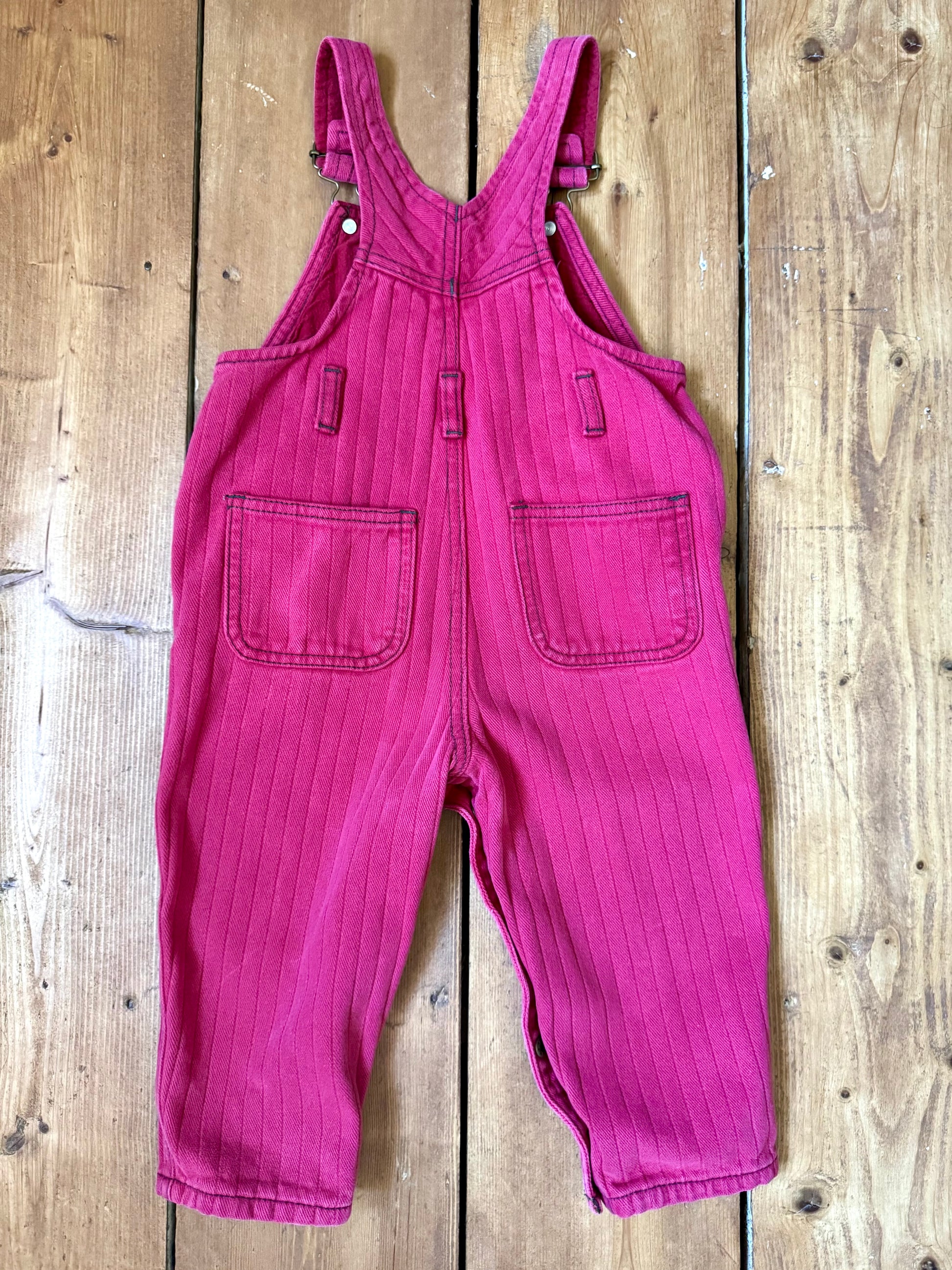Vintage 90s kids pink pin striped dungarees from French DPAM brand. Age 1-2 years. Handpicked for Bee Tiny kids vintage.
