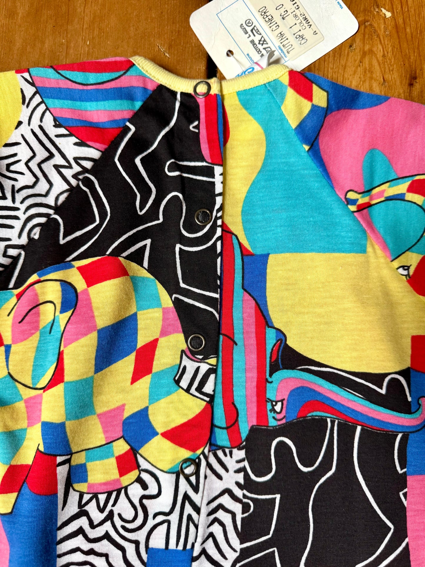 Vintage 90s colourful elephant baby romper with bold prints. Handpicked for Bee Tiny kids vintage.