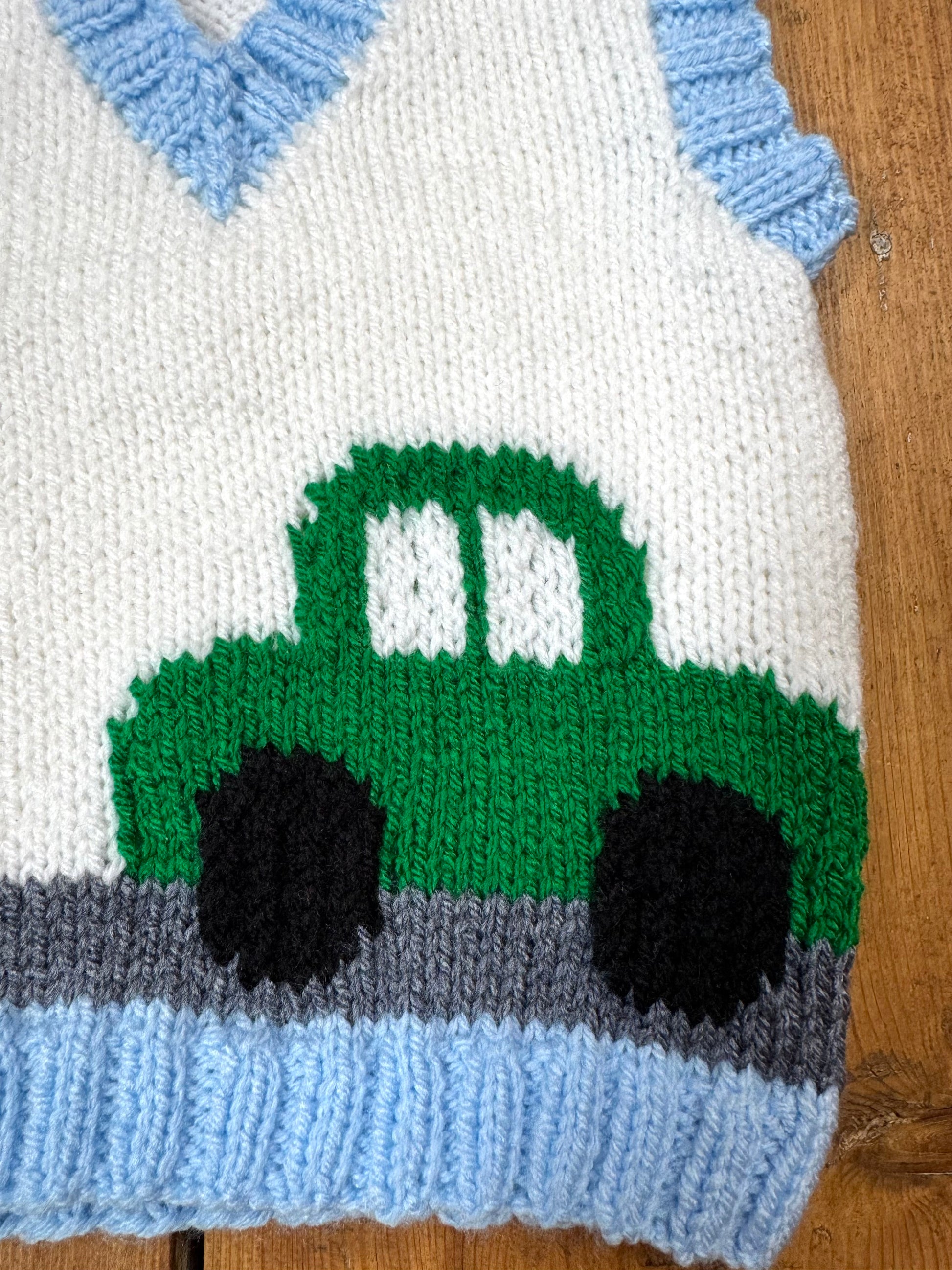 Handknitted vintage style kids sweater vest with car detail. Handpicked for Bee Tiny.