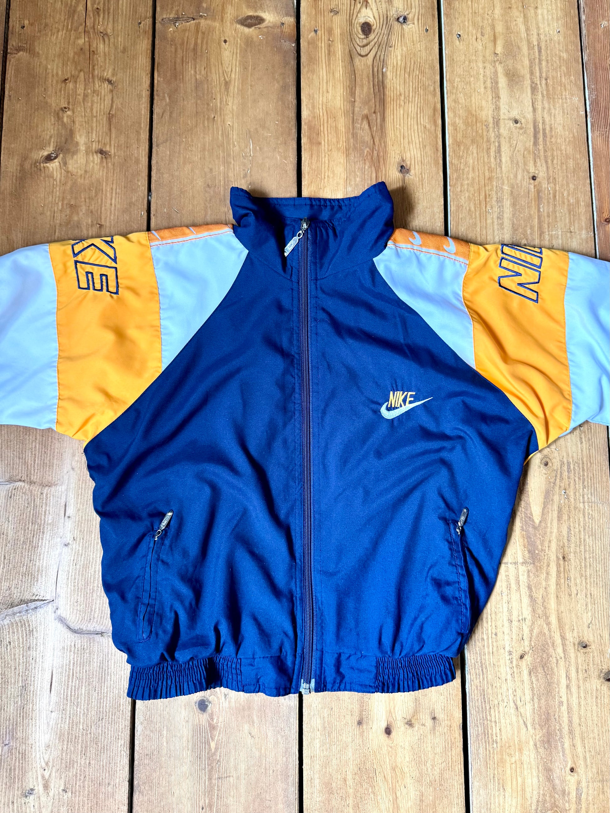 Kids vintage 90s Nike windbreaker jacket. Vintage kids jacket. Nike spellout jacket. Handpicked for Bee Tiny kids vintage.