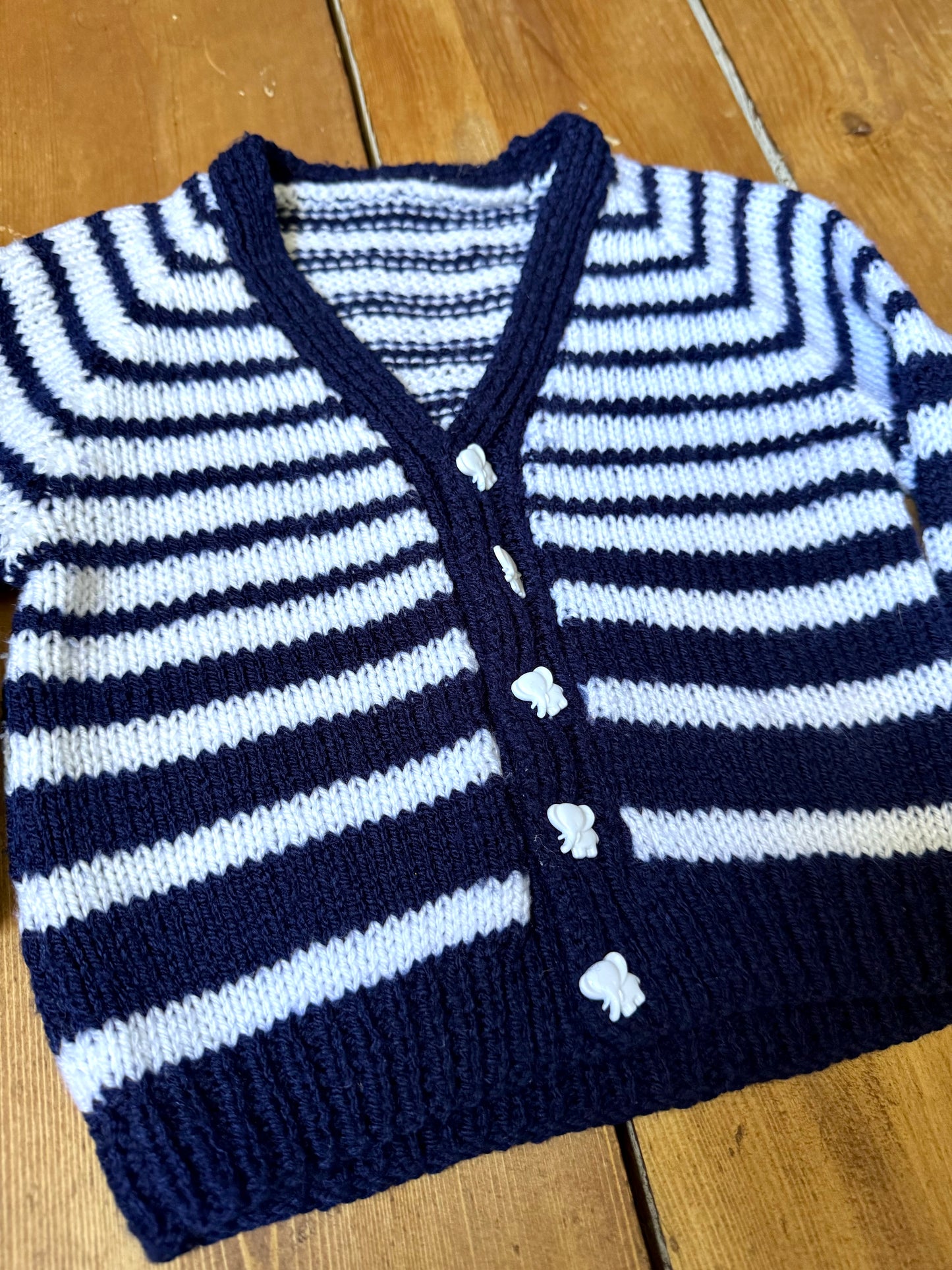 Vintage handknitted kids blue and white striped cardigan with elephant buttons. Age 1 year. Handpicked for Bee Tiny kids vintage.