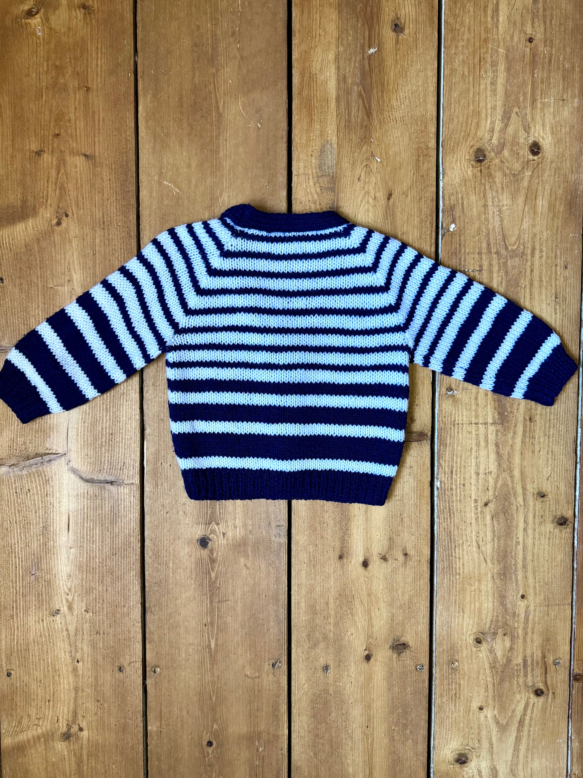 Vintage handknitted kids blue and white striped cardigan with elephant buttons. Age 1 year. Handpicked for Bee Tiny kids vintage.