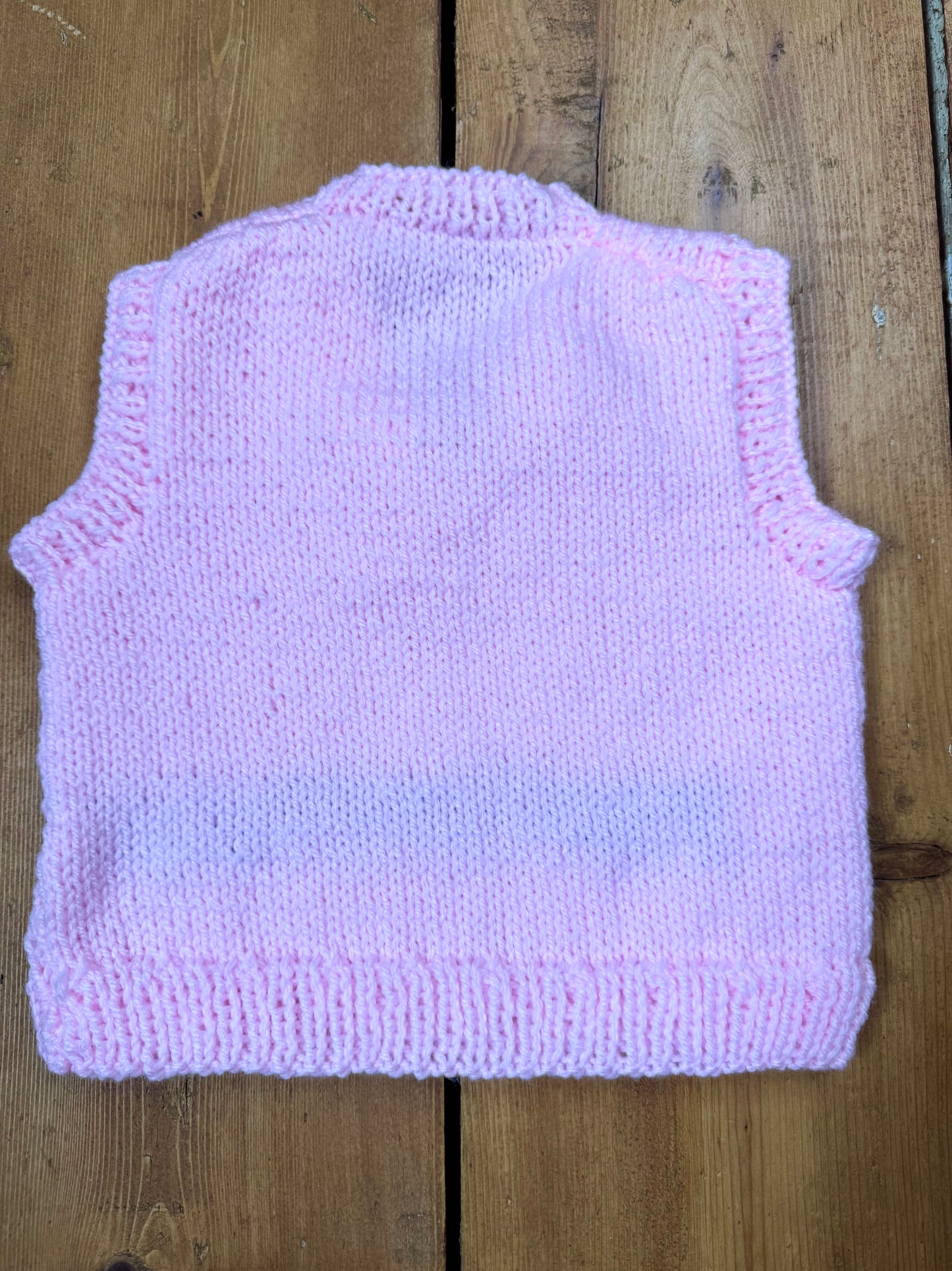 Handknitted pink kids sweater vest with a heart design. Age 1 year. Handpicked for Bee Tiny kids vintage. 