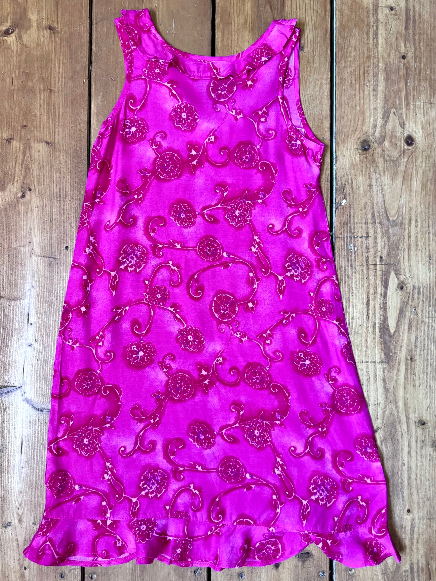 Vintage Y2K fuchsia floral occasion dress for kids. Lightweight 100% viscose with wrap neckline and fluted hem. Handpicked for Bee Tiny kids vintage.
