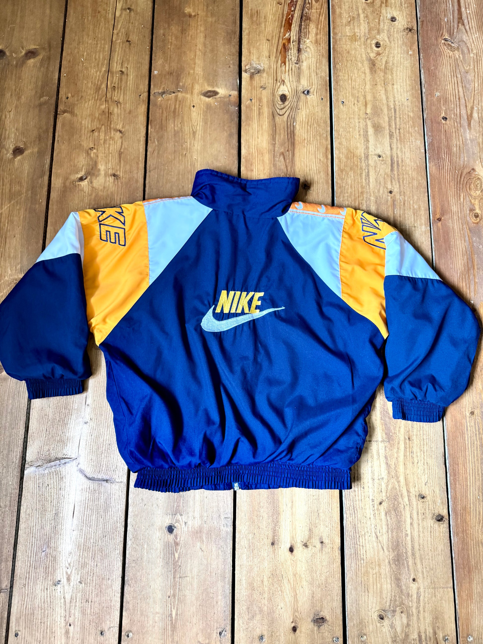 Kids vintage 90s Nike windbreaker jacket. Vintage kids jacket. Nike spellout jacket. Handpicked for Bee Tiny kids vintage.