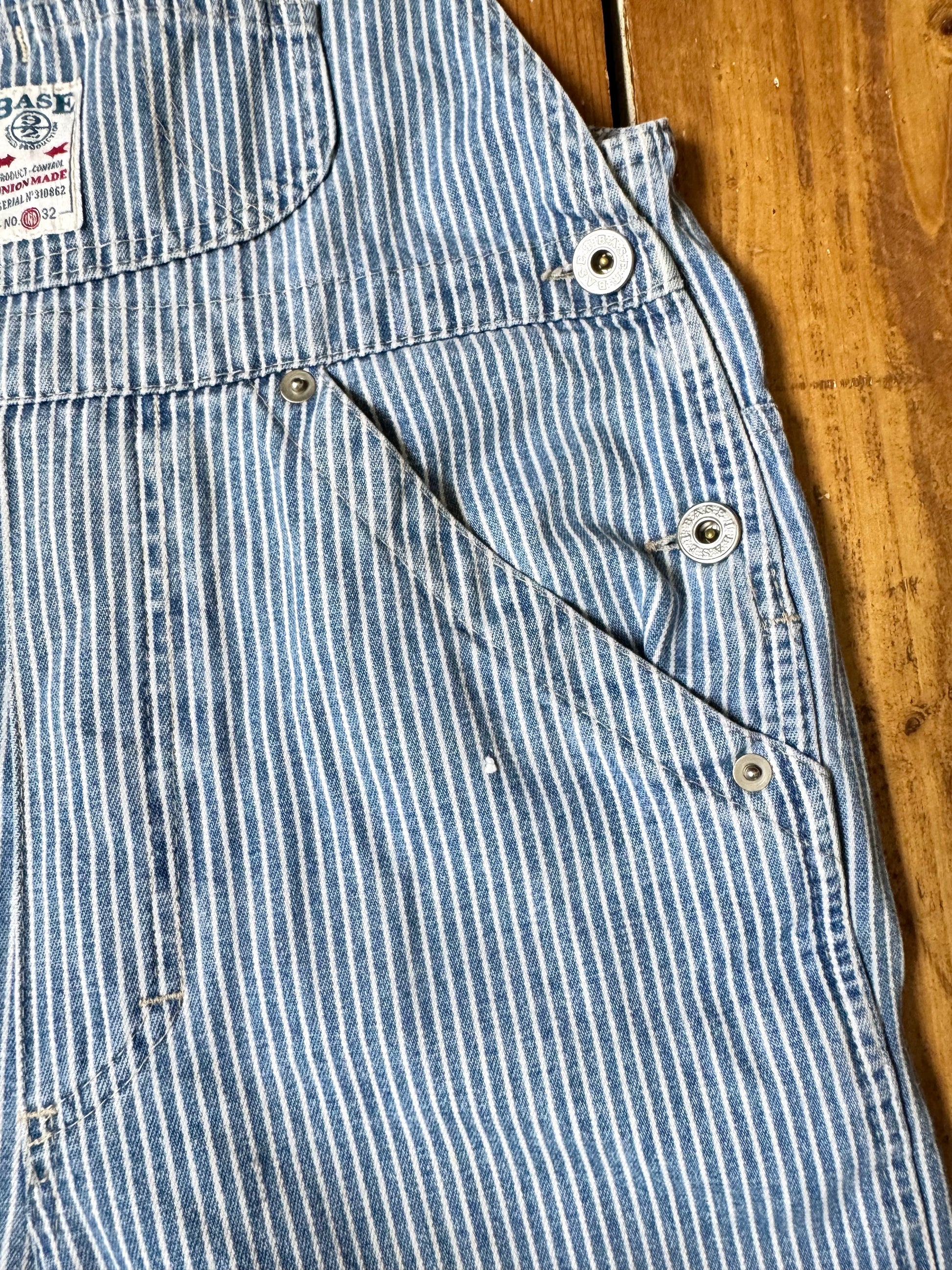 Vintage 90s hickory stripe denim short dungarees with adjustable straps. Vintage kids dungaree shorts. Handpicked for Bee Tiny kids vintage.