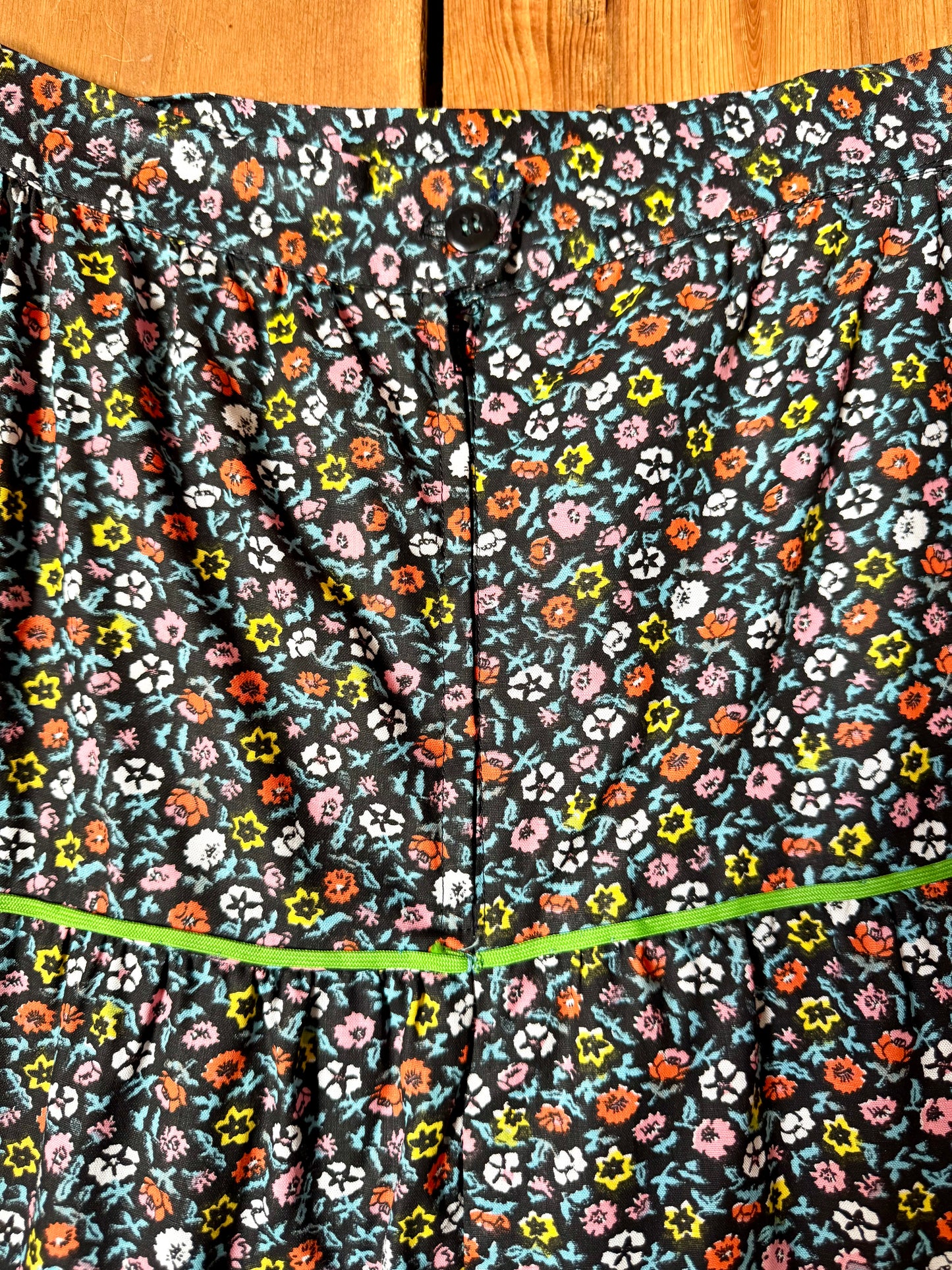 Vintage Italian floral tiered skirt from the late 80s/early 90s with colourful contrast piping and a timeless ditsy print. Handpicked for Bee Tiny kids vintage.