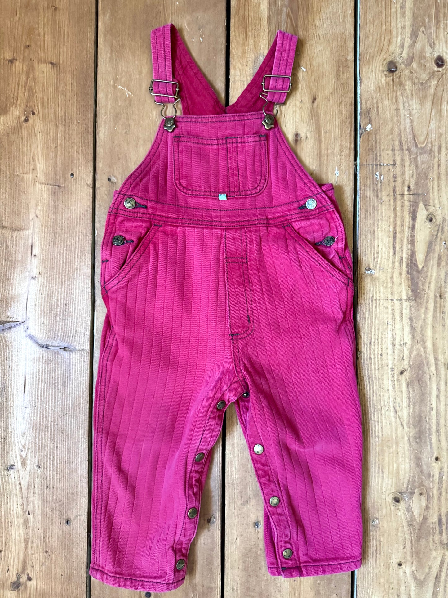 Vintage 90s kids pink pin striped dungarees from French DPAM brand. Age 1-2 years. Handpicked for Bee Tiny kids vintage.