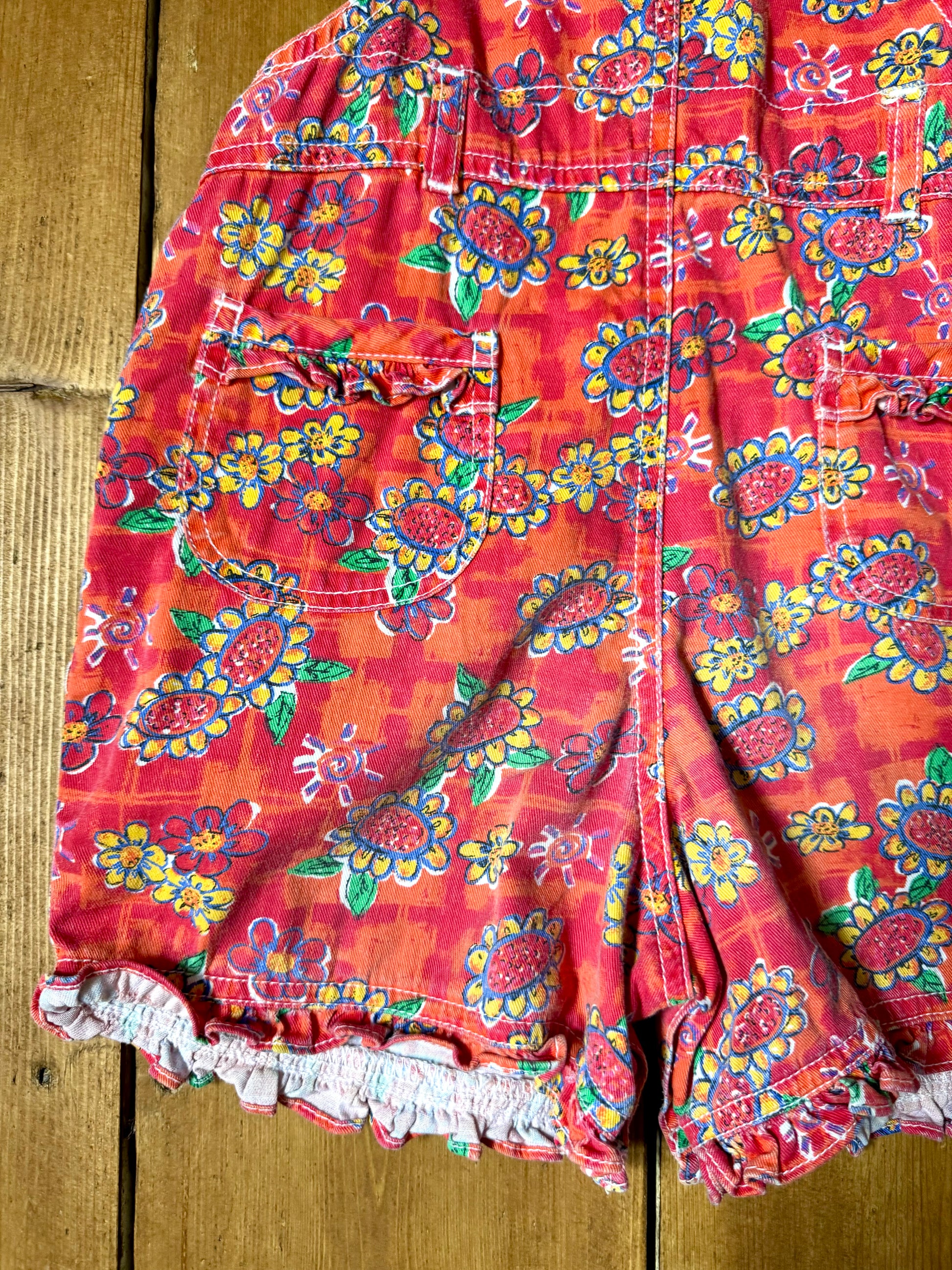 Vintage 90s Ladybird kids dungaree shorts. 90s floral print dungaree shorts. Age 1-2 years. Handpicked for Bee Tiny kids vintage.