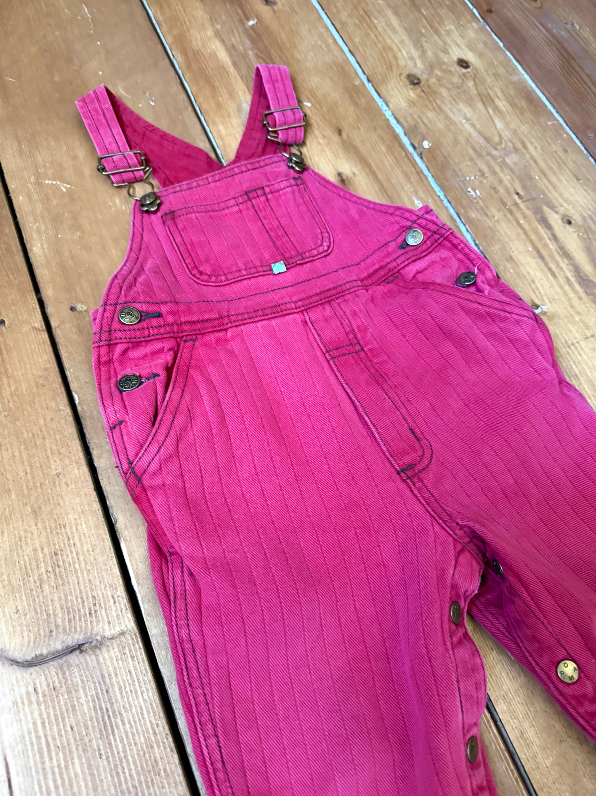 Vintage 90s kids pink pin striped dungarees from French DPAM brand. Age 1-2 years. Handpicked for Bee Tiny kids vintage.