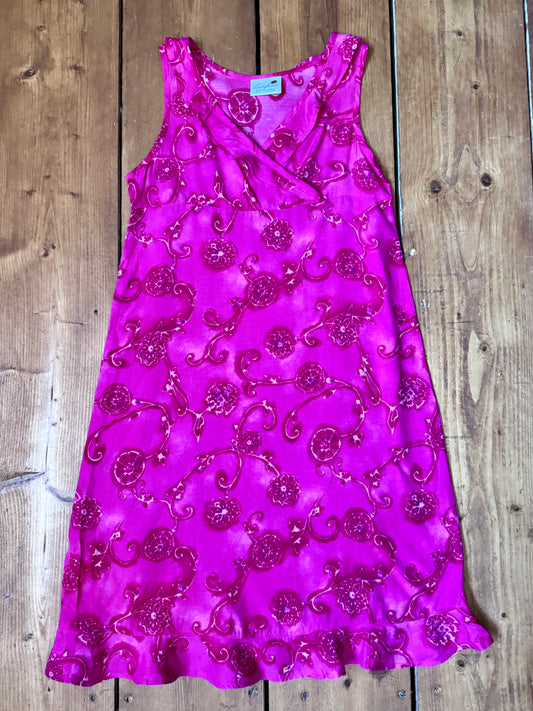 Vintage Y2K fuchsia floral occasion dress for kids. Lightweight 100% viscose with wrap neckline and fluted hem. Handpicked for Bee Tiny kids vintage.