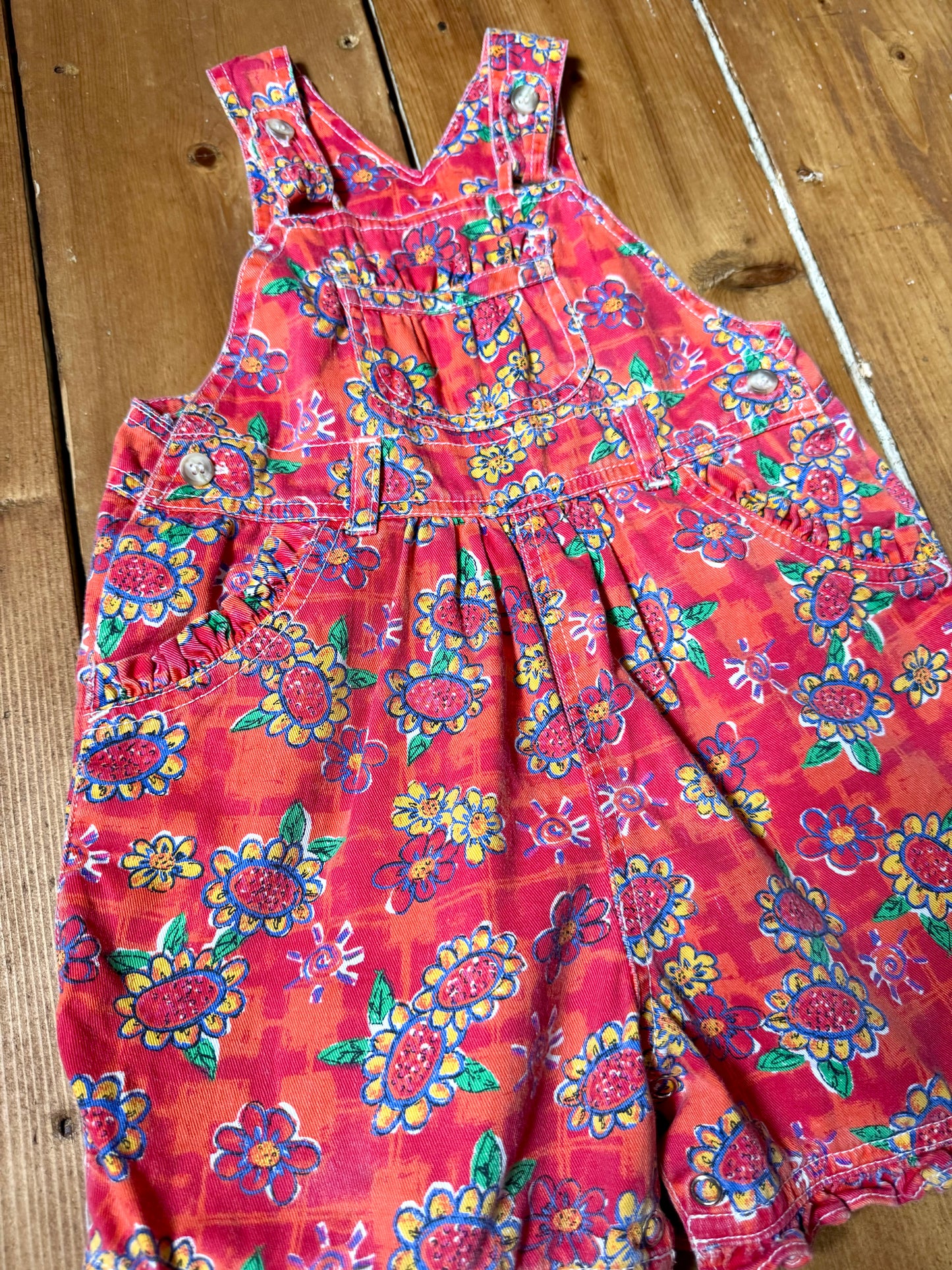 Vintage 90s Ladybird kids dungaree shorts. 90s floral print dungaree shorts. Age 1-2 years. Handpicked for Bee Tiny kids vintage.
