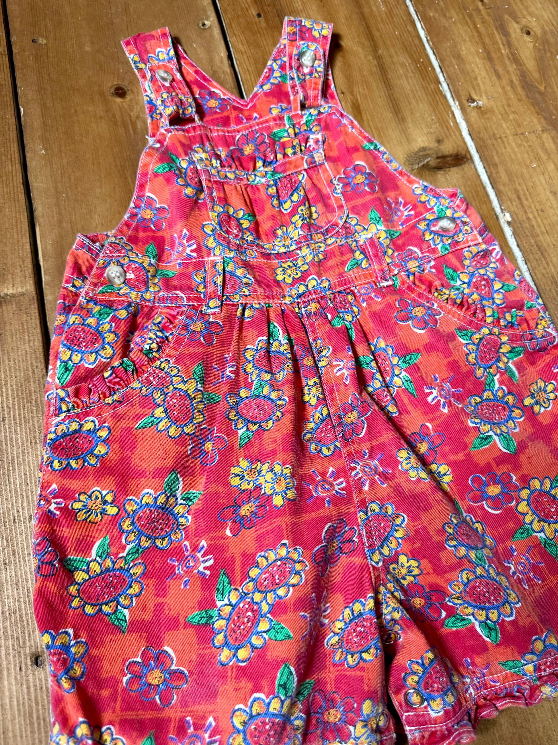 Vintage 90s Ladybird kids dungaree shorts. 90s floral print dungaree shorts. Age 1-2 years. Handpicked for Bee Tiny kids vintage.