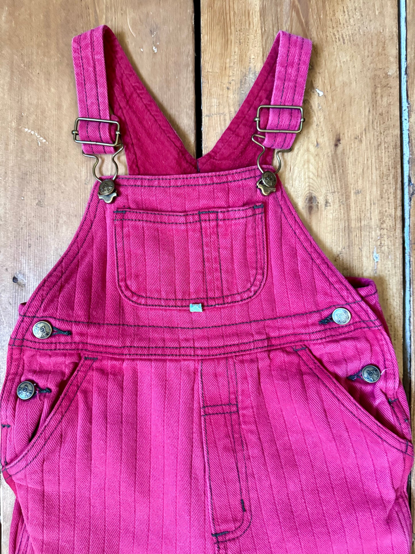 Vintage 90s kids pink pin striped dungarees from French DPAM brand. Age 1-2 years. Handpicked for Bee Tiny kids vintage.