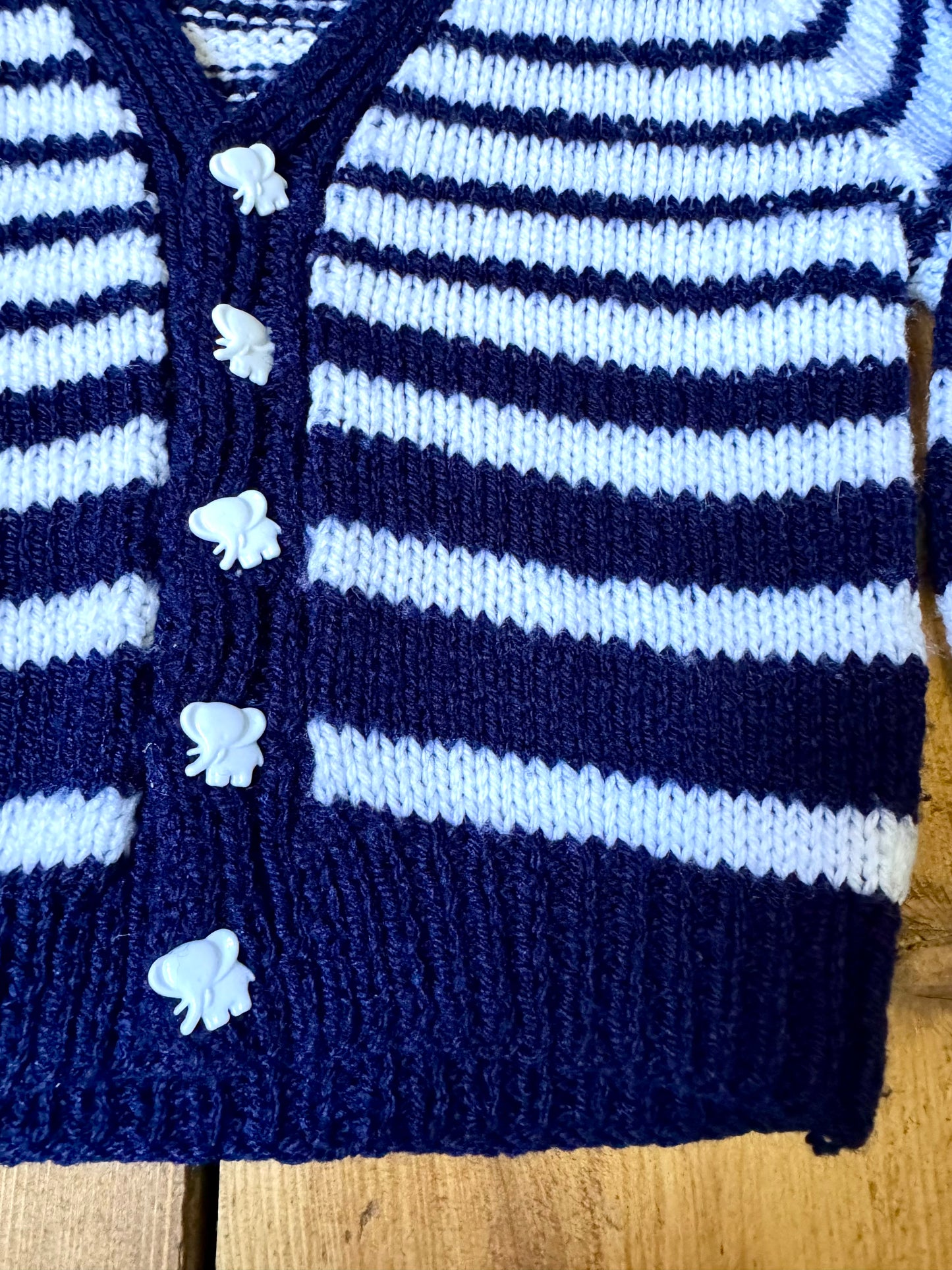 Vintage handknitted kids blue and white striped cardigan with elephant buttons. Age 1 year. Handpicked for Bee Tiny kids vintage.
