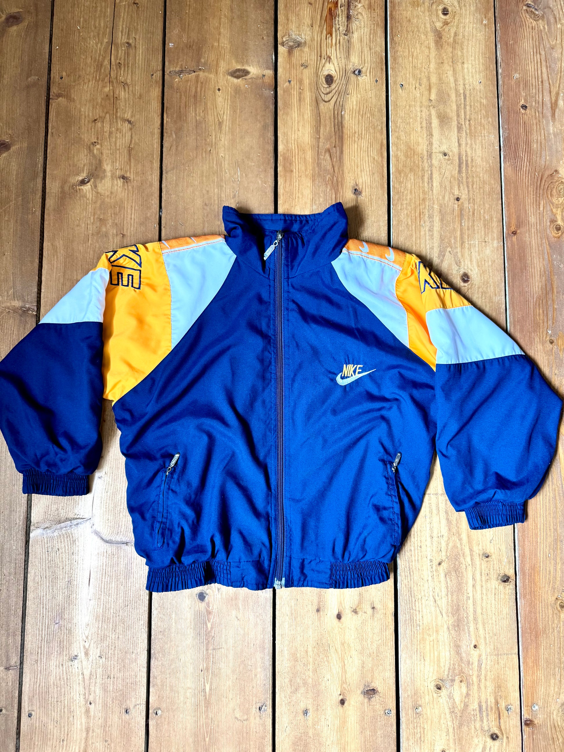 Kids vintage 90s Nike windbreaker jacket. Vintage kids jacket. Nike spellout jacket. Handpicked for Bee Tiny kids vintage.