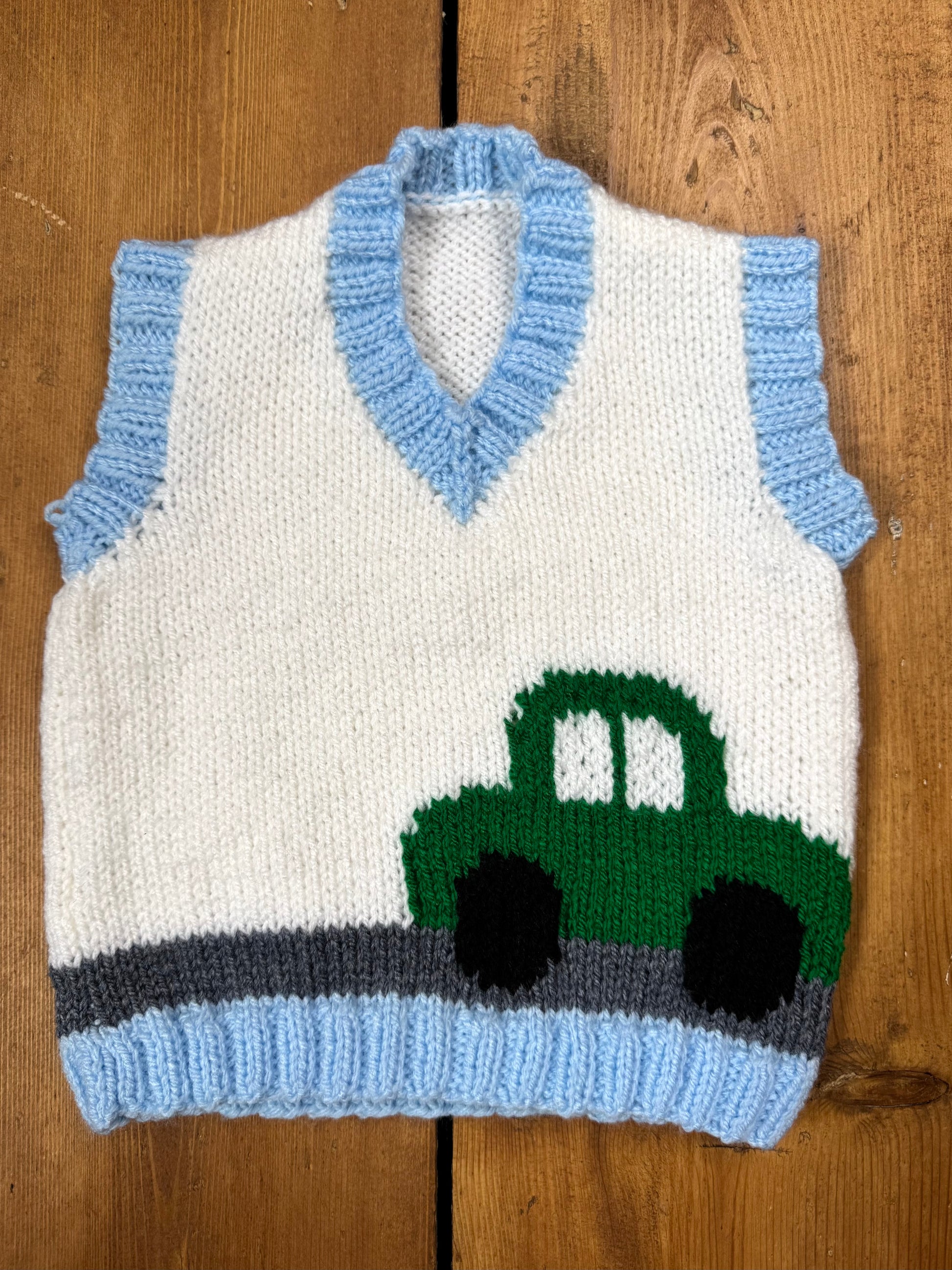 Handknitted vintage style kids sweater vest with car detail. Handpicked for Bee Tiny.