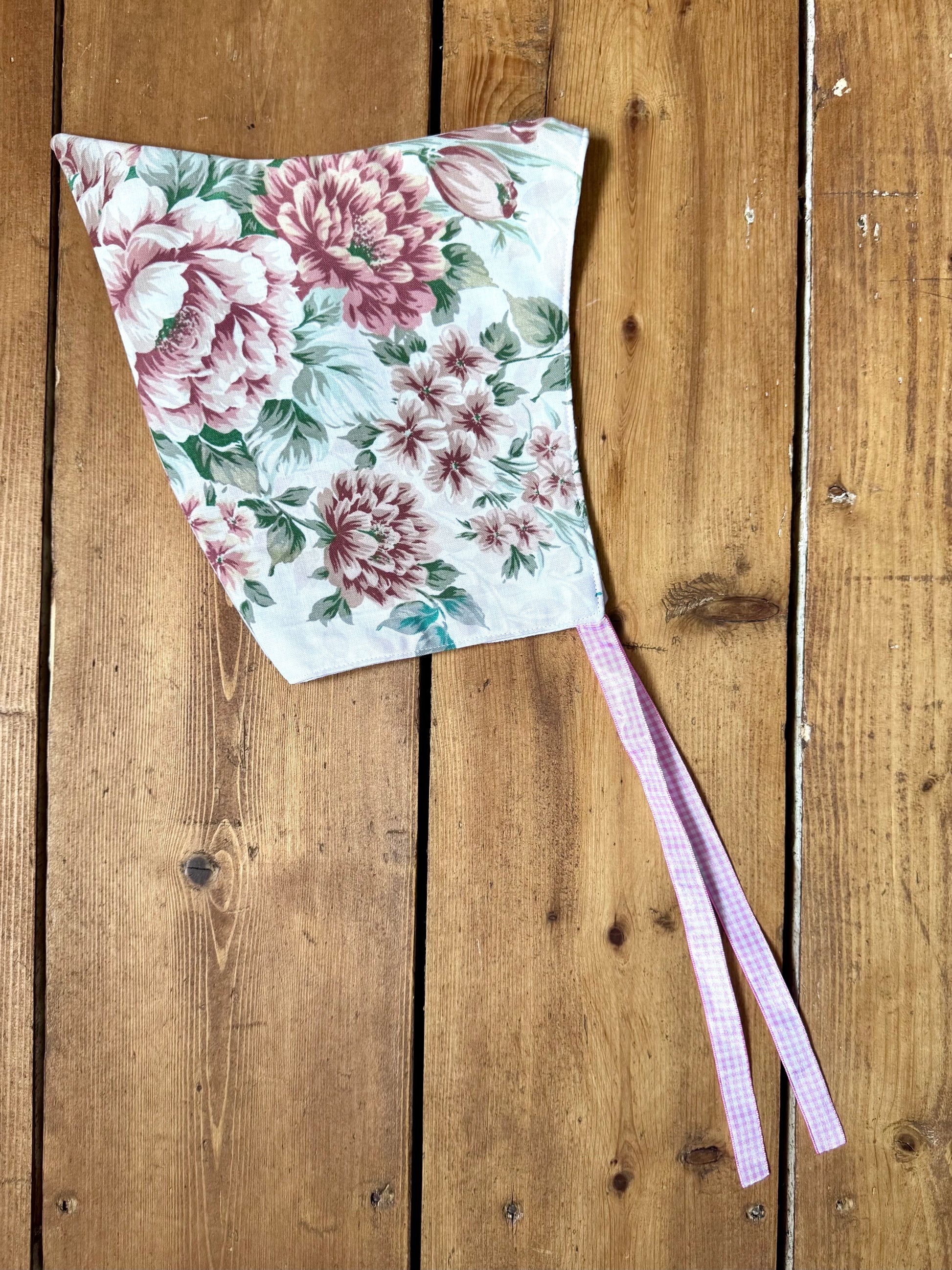 Handmade vintage floral children's set featuring wide-leg trousers and a matching pixie bonnet. One-of-a-kind, sustainably made from rescued fabric. Handmade for Bee Tiny kids vintage.