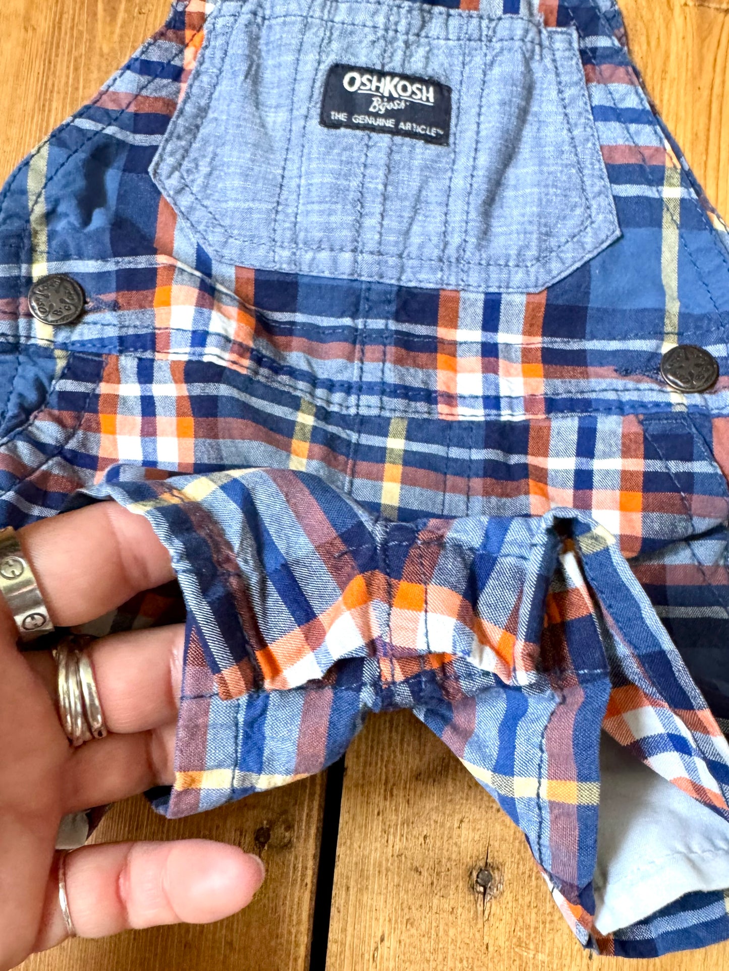 Vintage OshKosh checked dungaree shorts, in blue and orange check.Authentic early 2000s baby dungarees handpicked for Bee Tiny kids vintage.