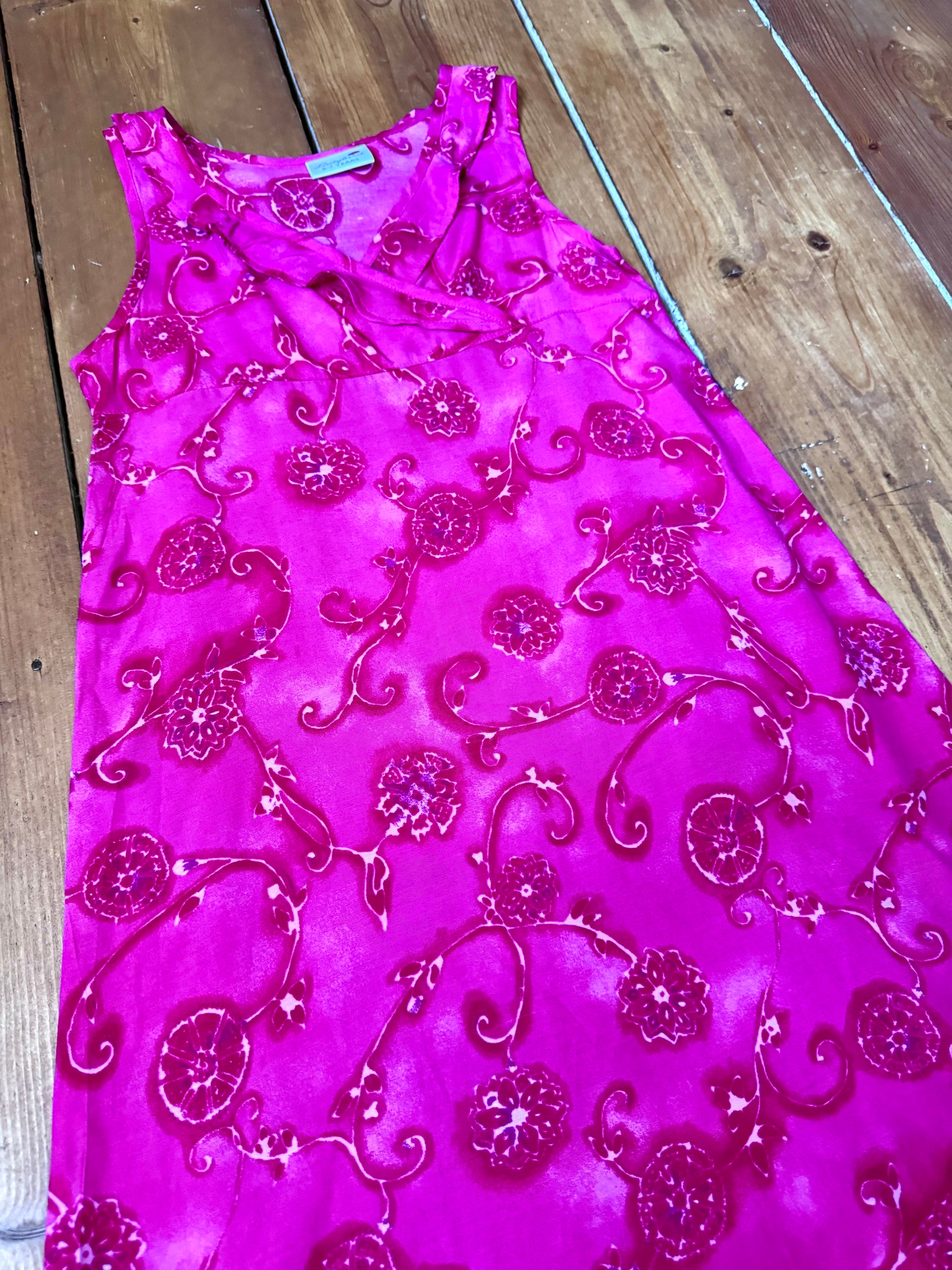 Vintage Y2K fuchsia floral occasion dress for kids. Lightweight 100% viscose with wrap neckline and fluted hem. Handpicked for Bee Tiny kids vintage.