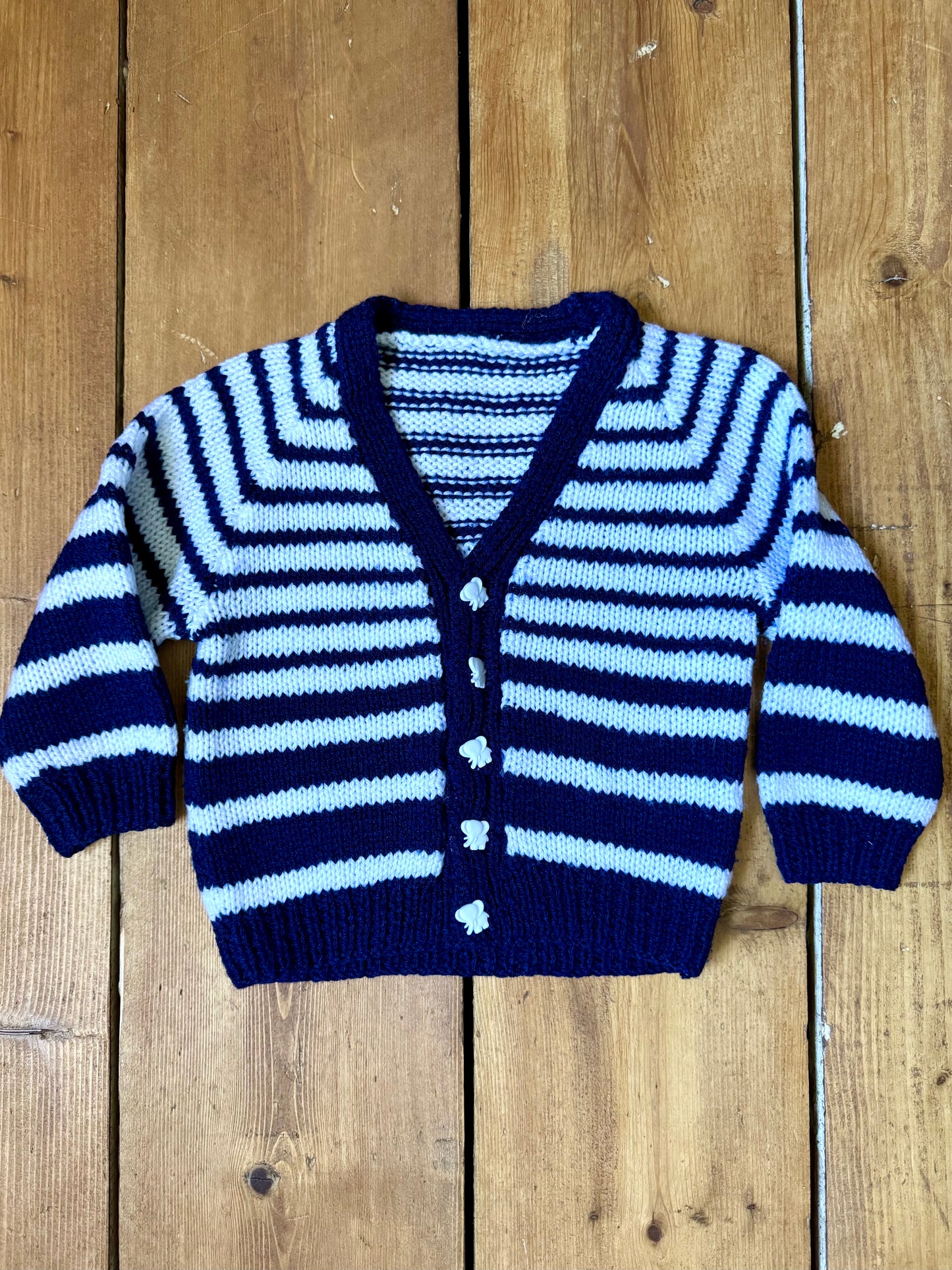 Vintage handknitted kids blue and white striped cardigan with elephant buttons. Age 1 year. Handpicked for Bee Tiny kids vintage.