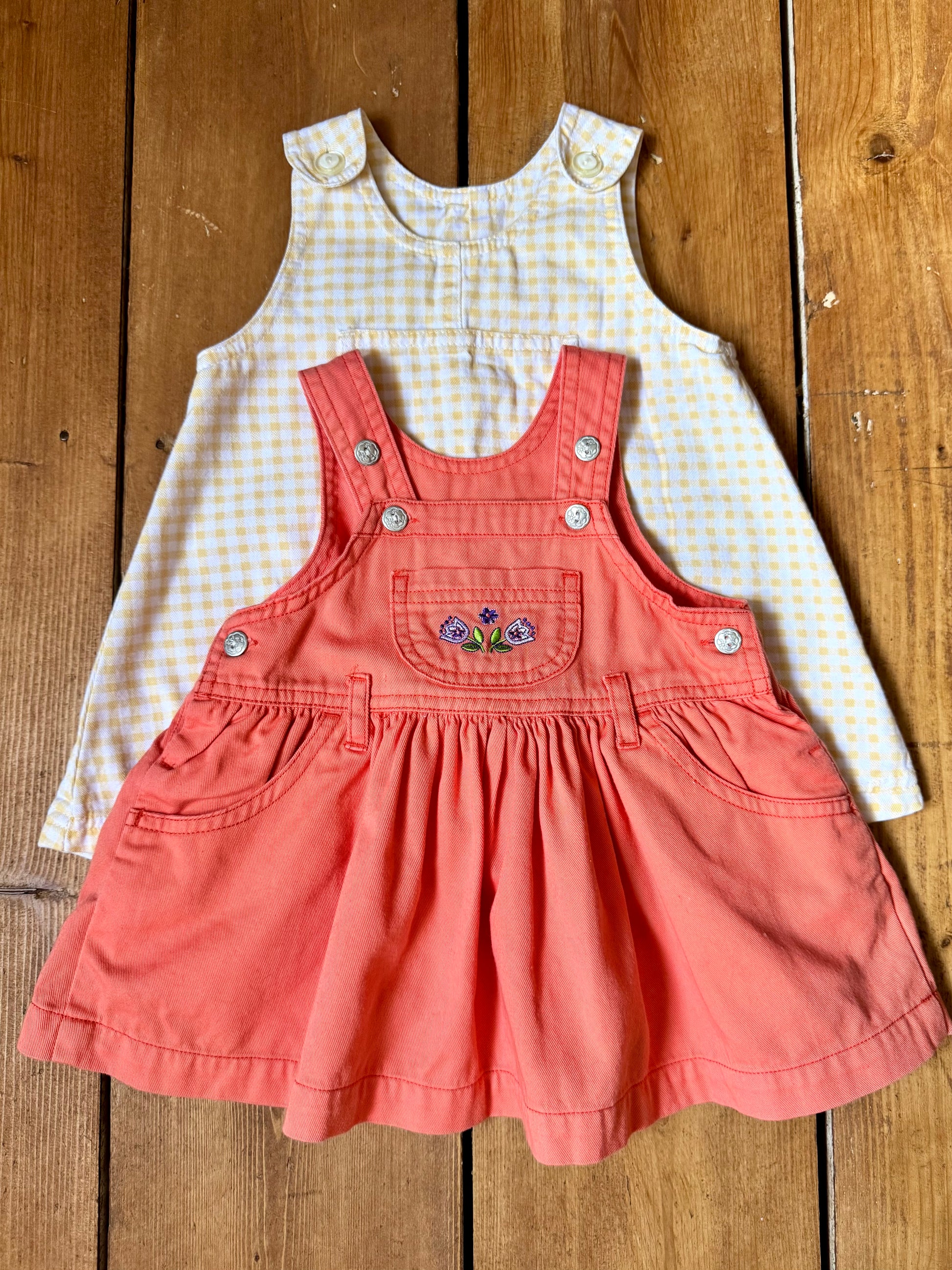 Baby girls' 2 piece summer pinafore dress bundle in 3 months, featuring a coral embroidered pinafore and yellow gingham dress. Handpicked for Bee Tiny kids vintage.