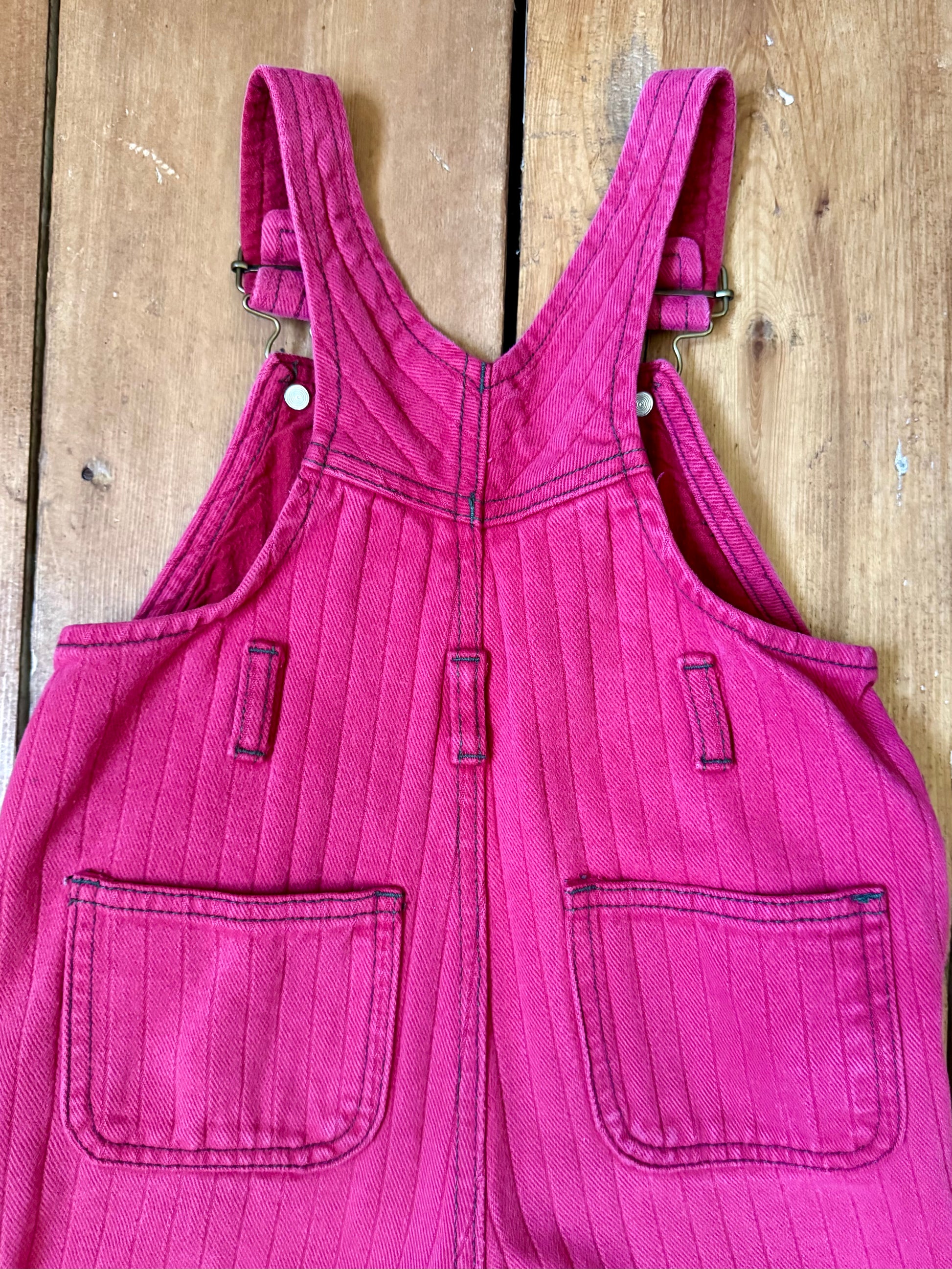 Vintage 90s kids pink pin striped dungarees from French DPAM brand. Age 1-2 years. Handpicked for Bee Tiny kids vintage.