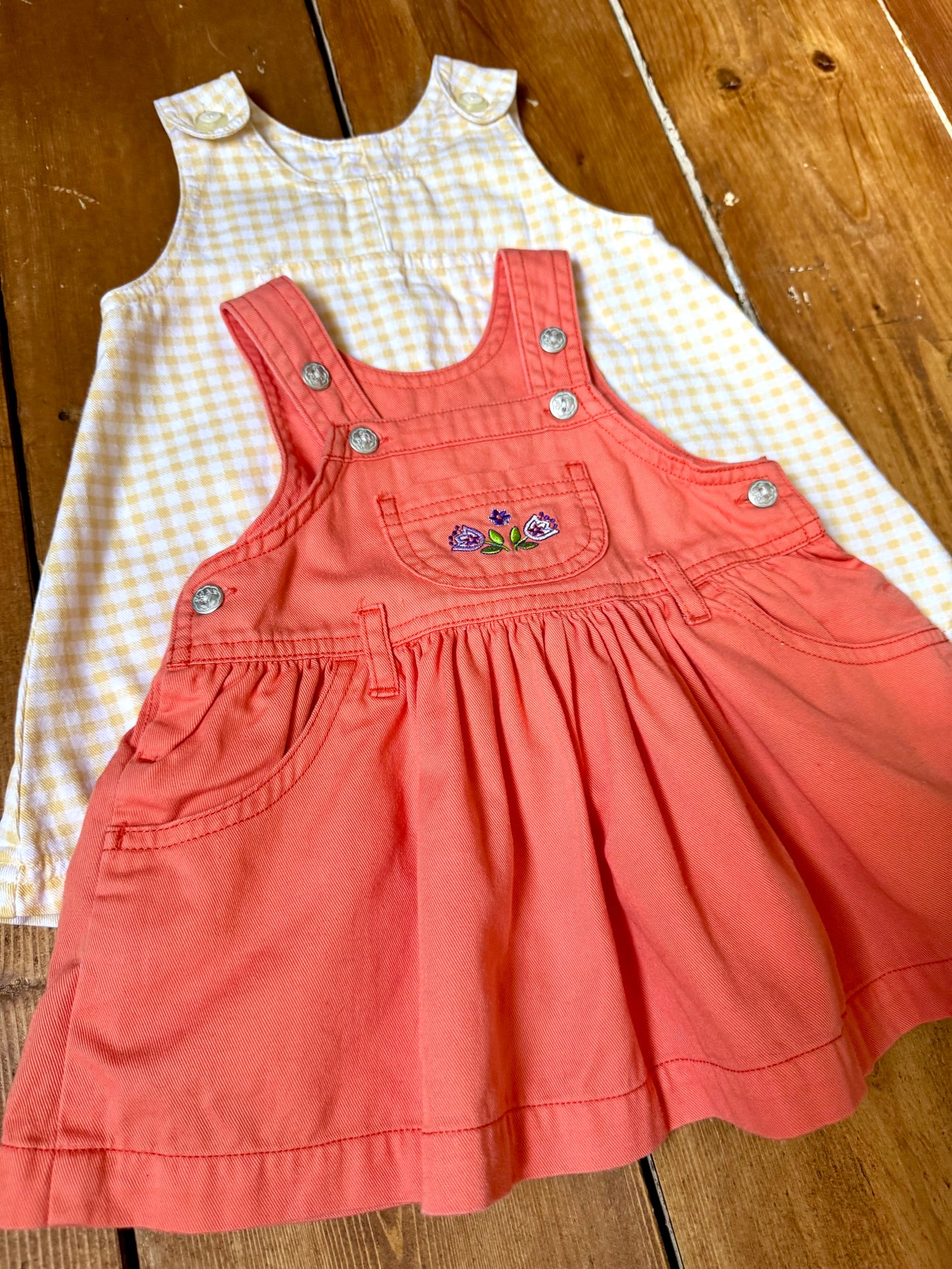 Baby girls' 2 piece summer pinafore dress bundle in 3 months, featuring a coral embroidered pinafore and yellow gingham dress. Handpicked for Bee Tiny kids vintage.