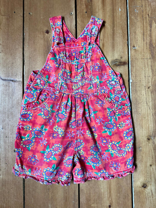 Vintage 90s Ladybird kids dungaree shorts. 90s floral print dungaree shorts. Age 1-2 years. Handpicked for Bee Tiny kids vintage.