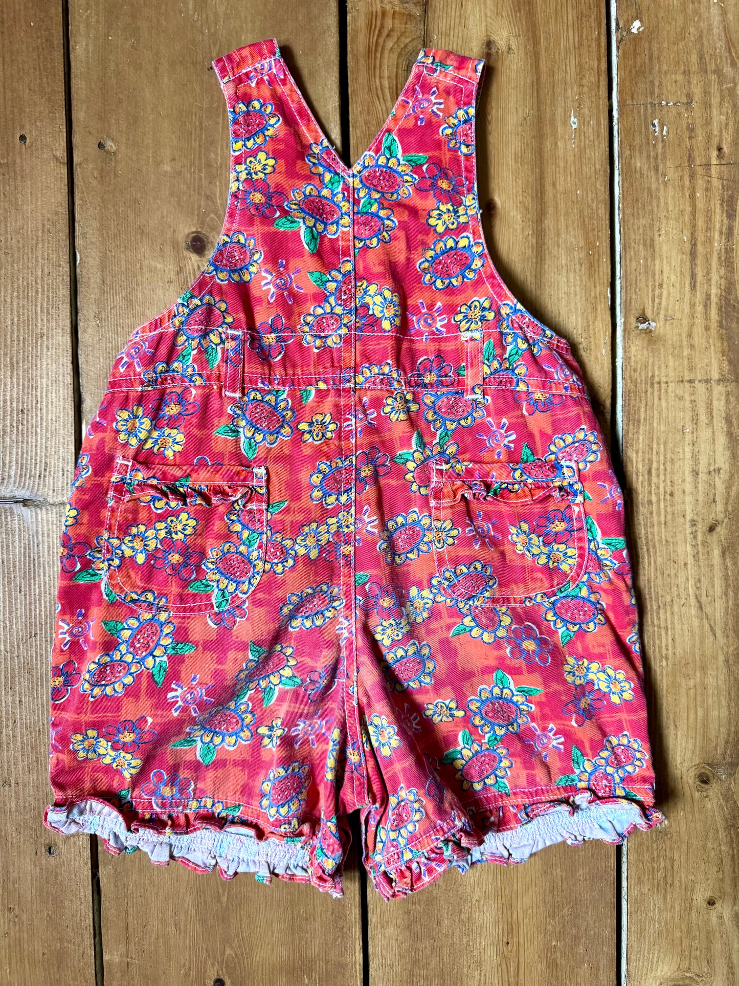 Vintage 90s Ladybird kids dungaree shorts. 90s floral print dungaree shorts. Age 1-2 years. Handpicked for Bee Tiny kids vintage.