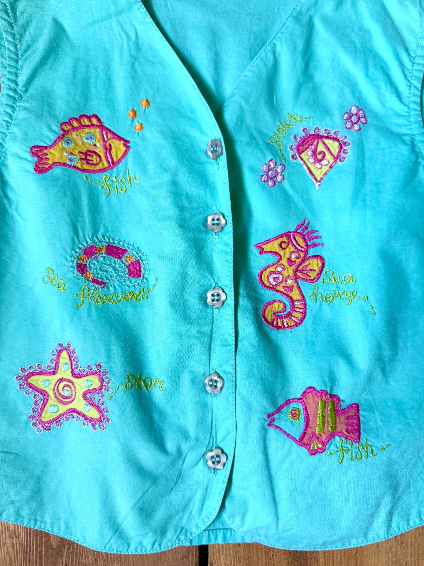 Vintage Y2K embroidered sea life waistcoat for kids with colourful fish details. Perfect for summer adventures. Handpicked for Bee Tiny kids vintage.
