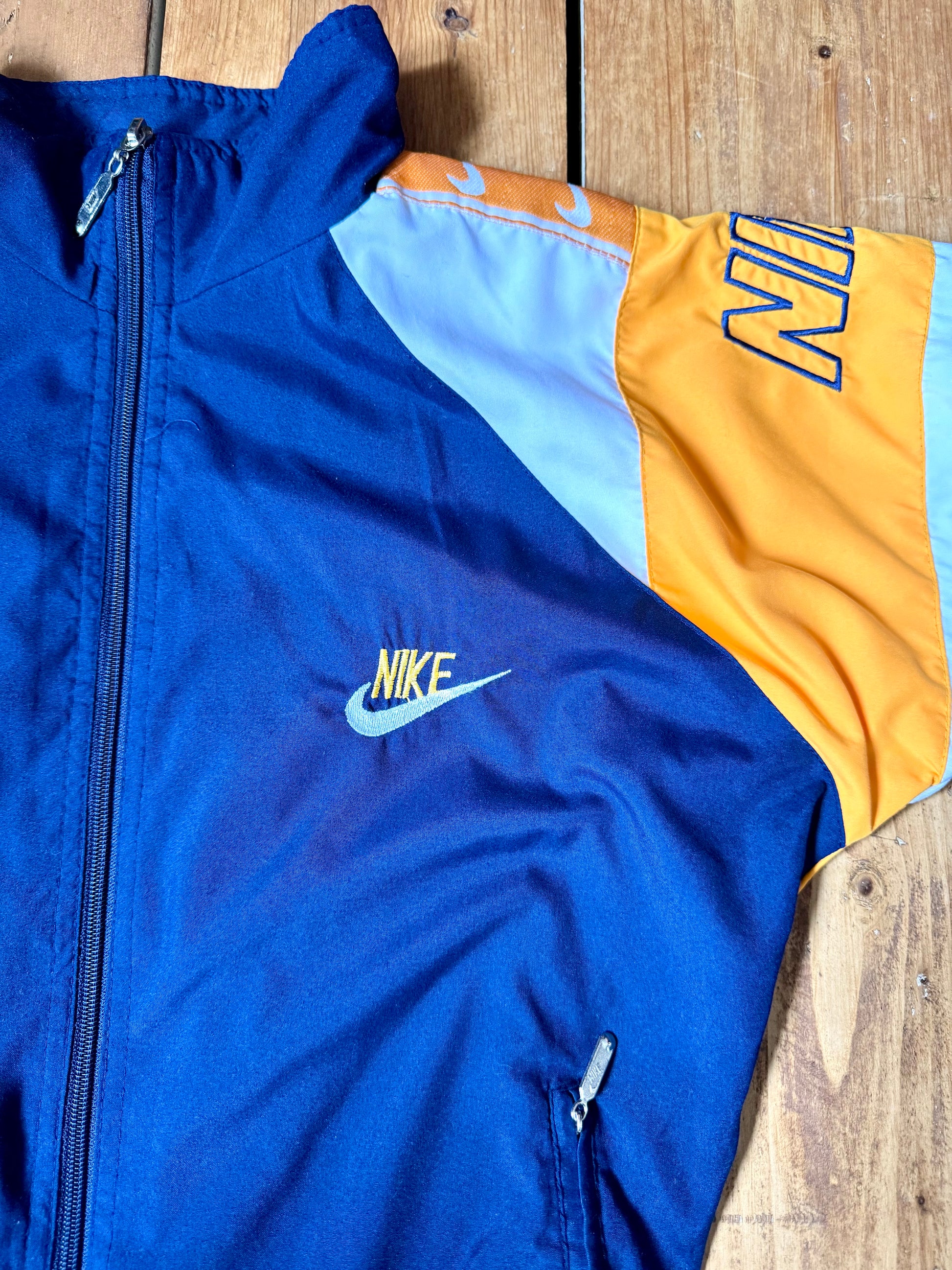 Kids vintage 90s Nike windbreaker jacket. Vintage kids jacket. Nike spellout jacket. Handpicked for Bee Tiny kids vintage.