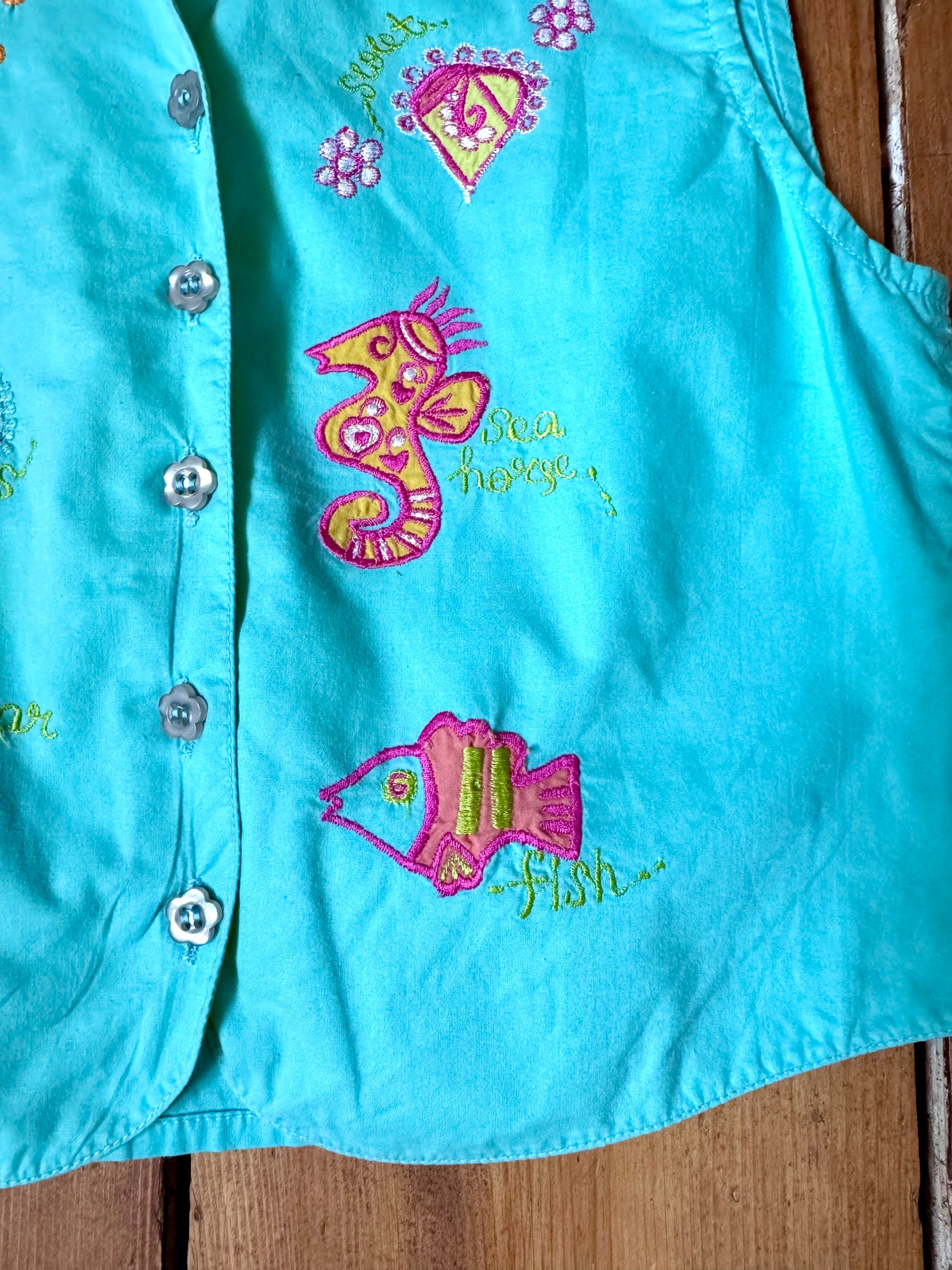 Vintage Y2K embroidered sea life waistcoat for kids with colourful fish details. Perfect for summer adventures. Handpicked for Bee Tiny kids vintage.